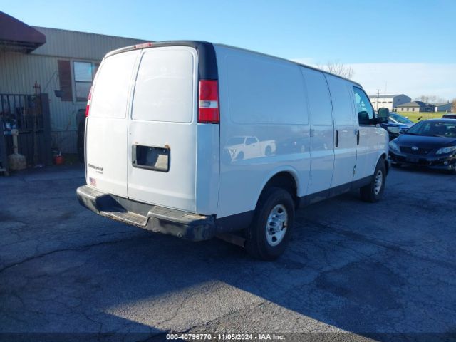 Photo 3 VIN: 1GCWGFCF3F1273994 - CHEVROLET EXPRESS 