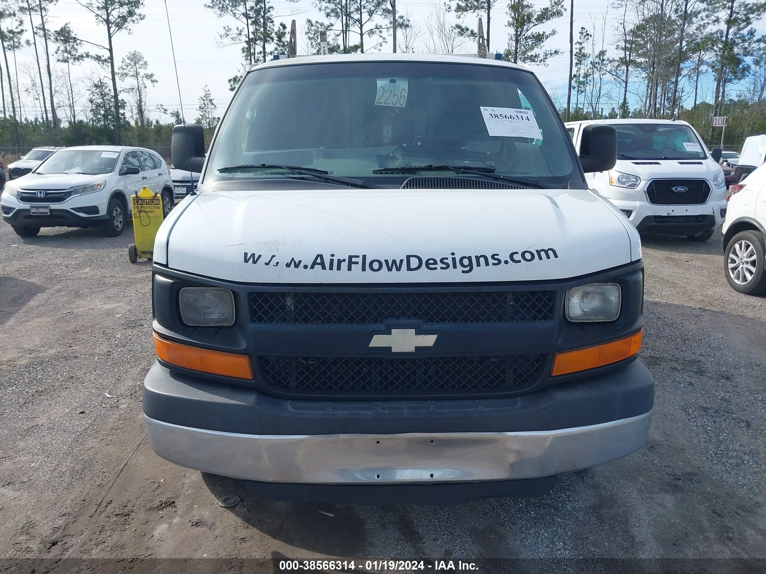 Photo 11 VIN: 1GCWGFCF6F1273679 - CHEVROLET EXPRESS 