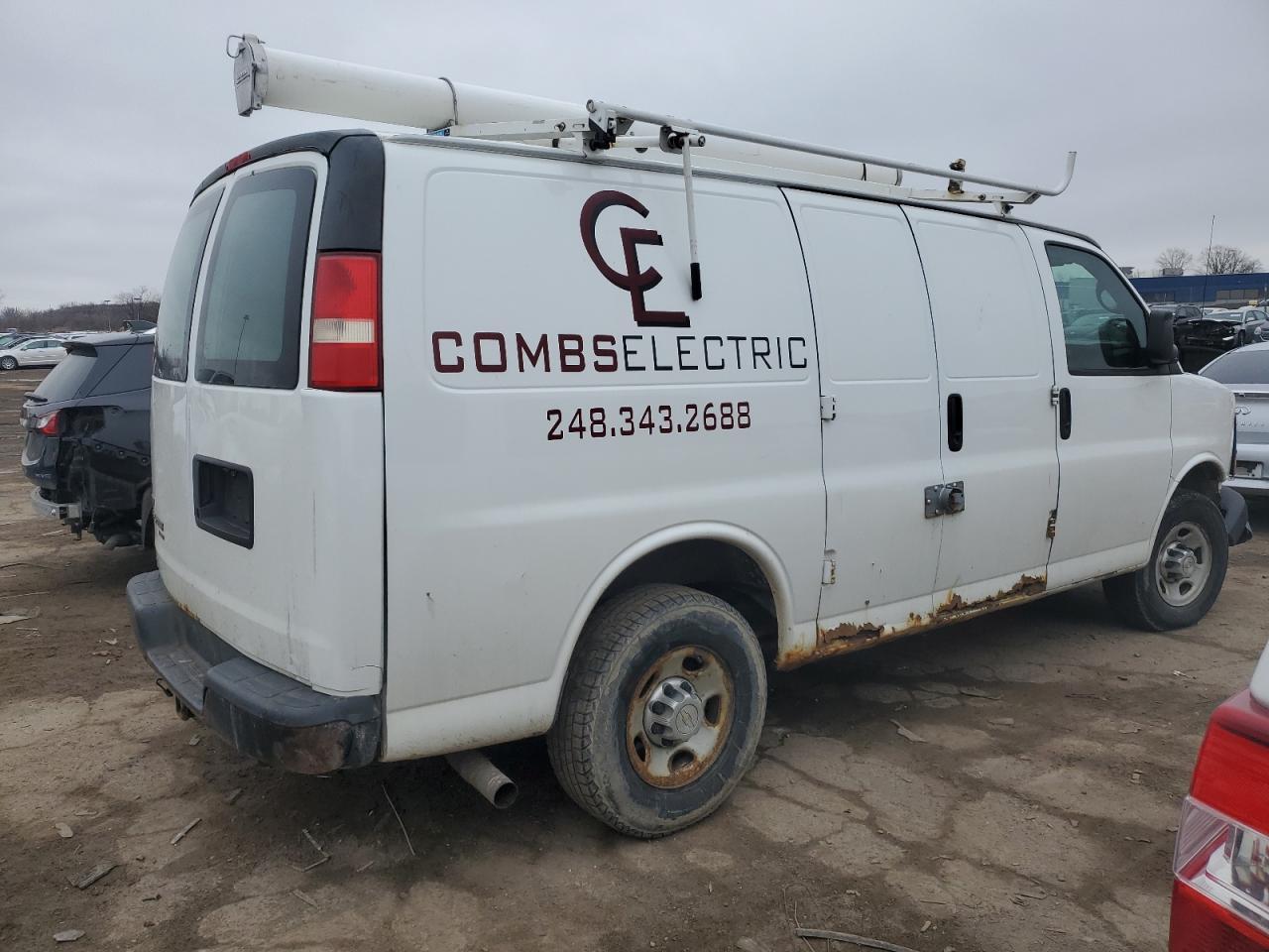 Photo 3 VIN: 1GCWGFFA2B1104608 - CHEVROLET EXPRESS 