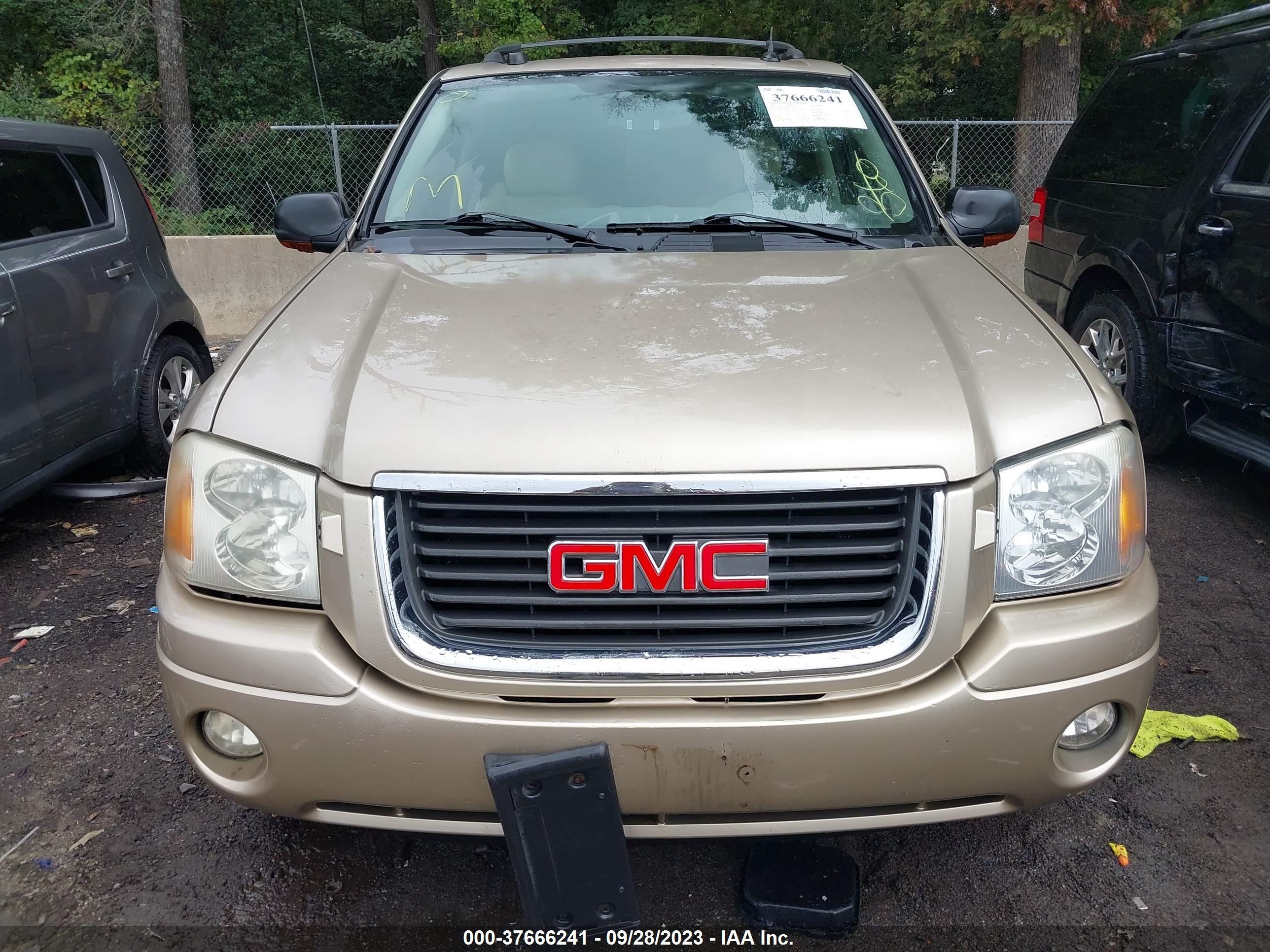 Photo 11 VIN: 1GKDT13SX52183385 - GMC ENVOY 