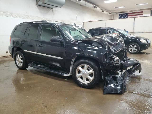 Photo 3 VIN: 1GKDT13SX82145627 - GMC ENVOY 