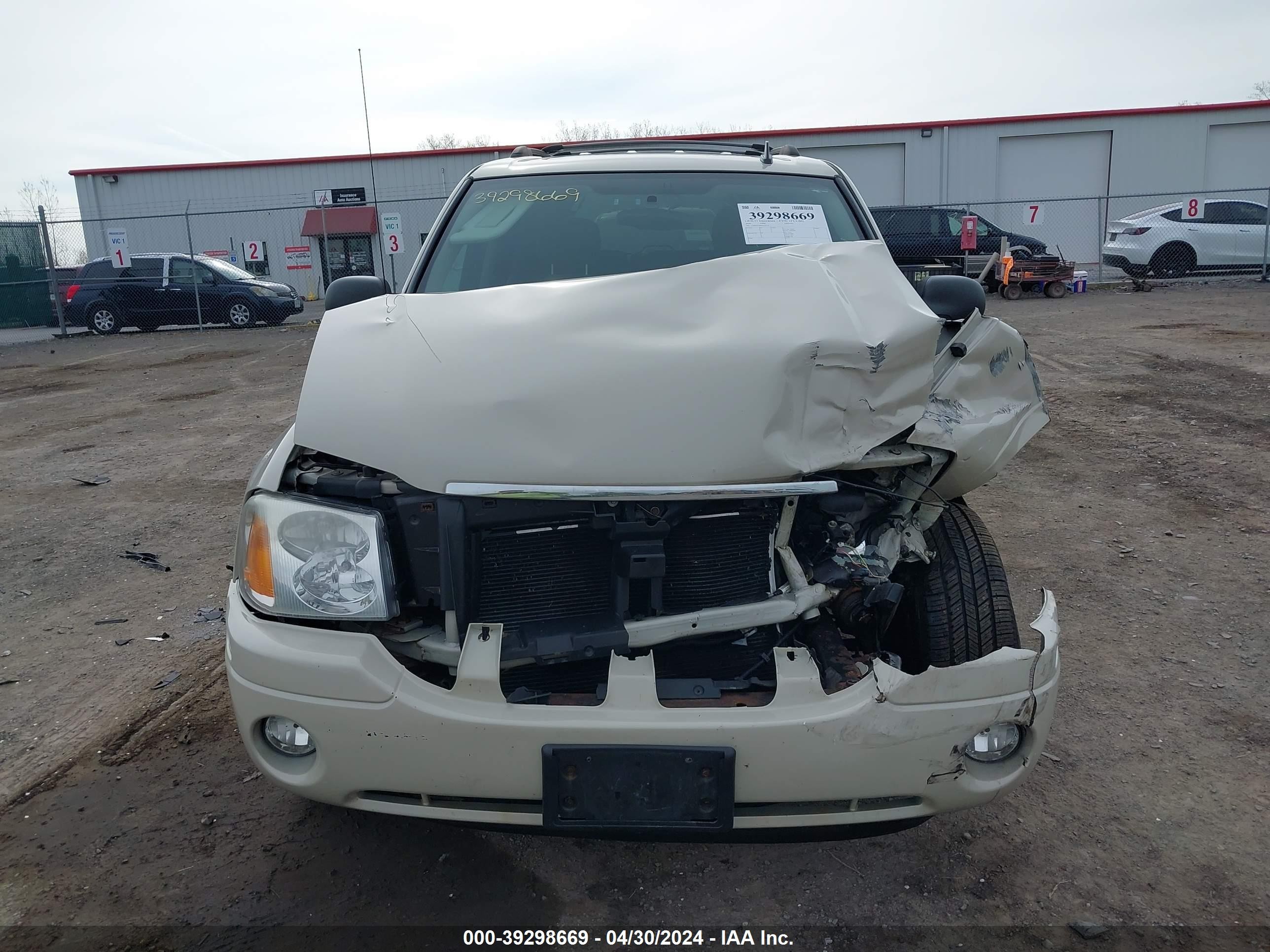 Photo 11 VIN: 1GKDT33S092102119 - GMC ENVOY 