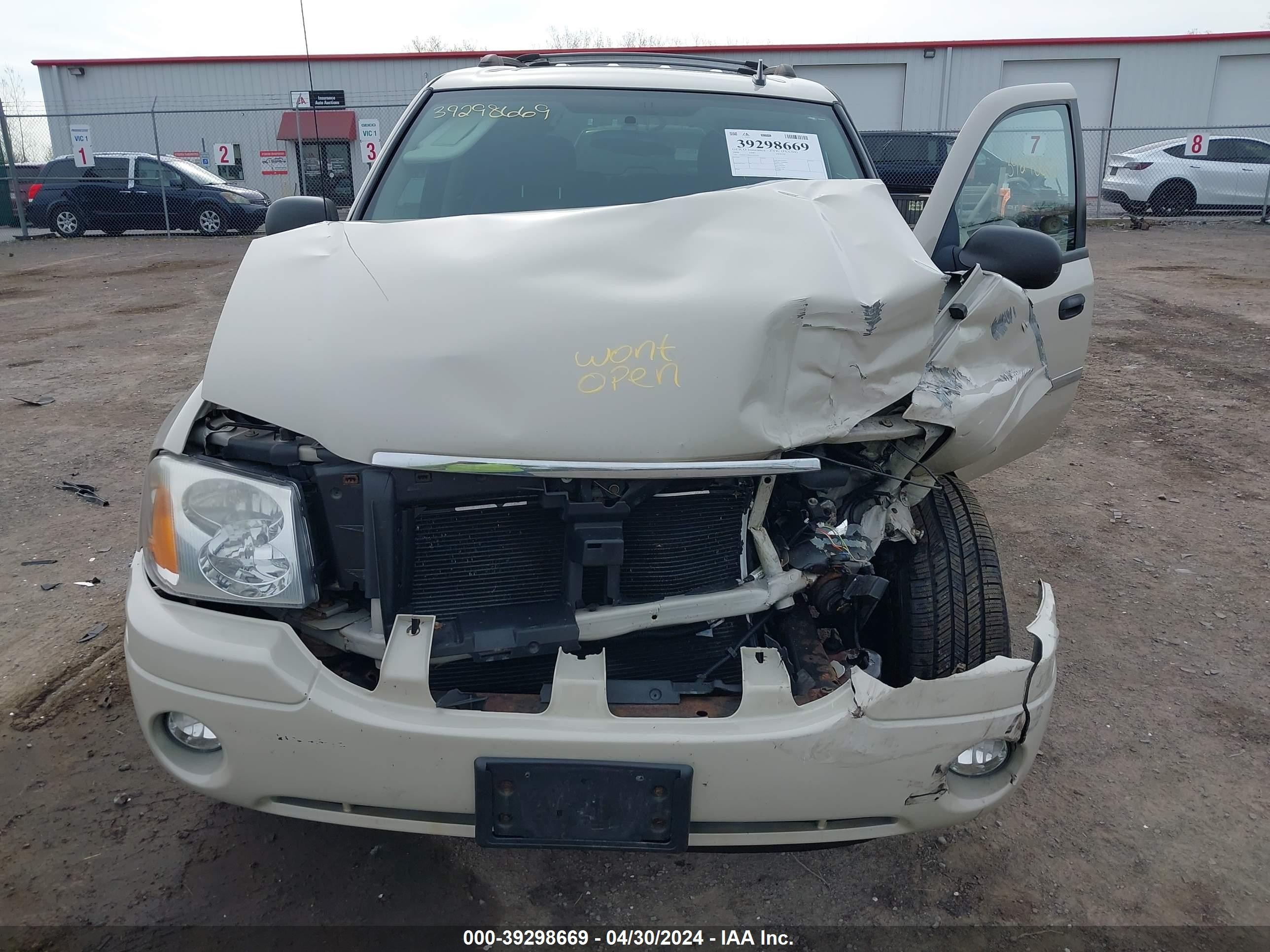 Photo 9 VIN: 1GKDT33S092102119 - GMC ENVOY 