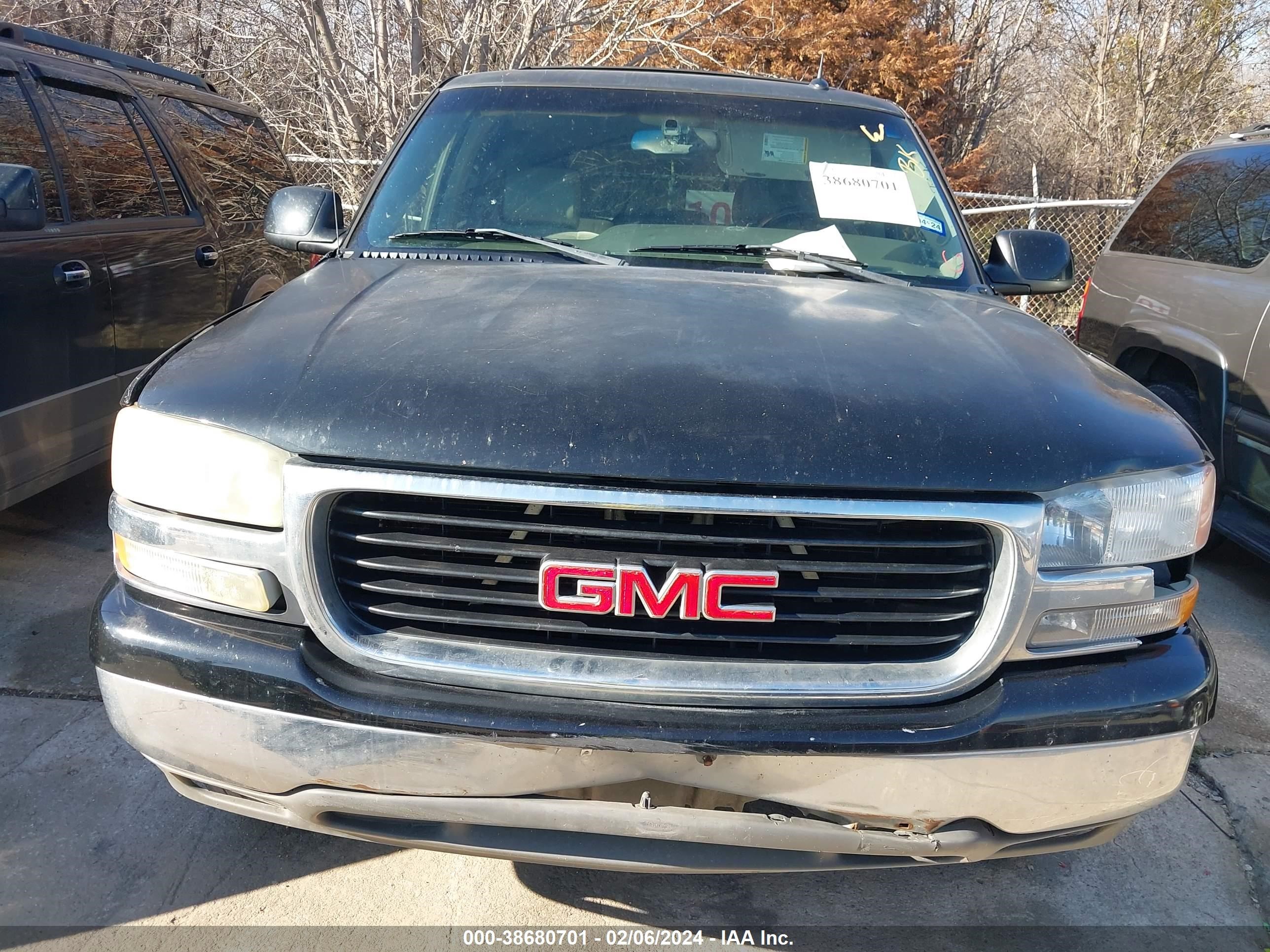 Photo 5 VIN: 1GKEC13T95R142282 - GMC YUKON 