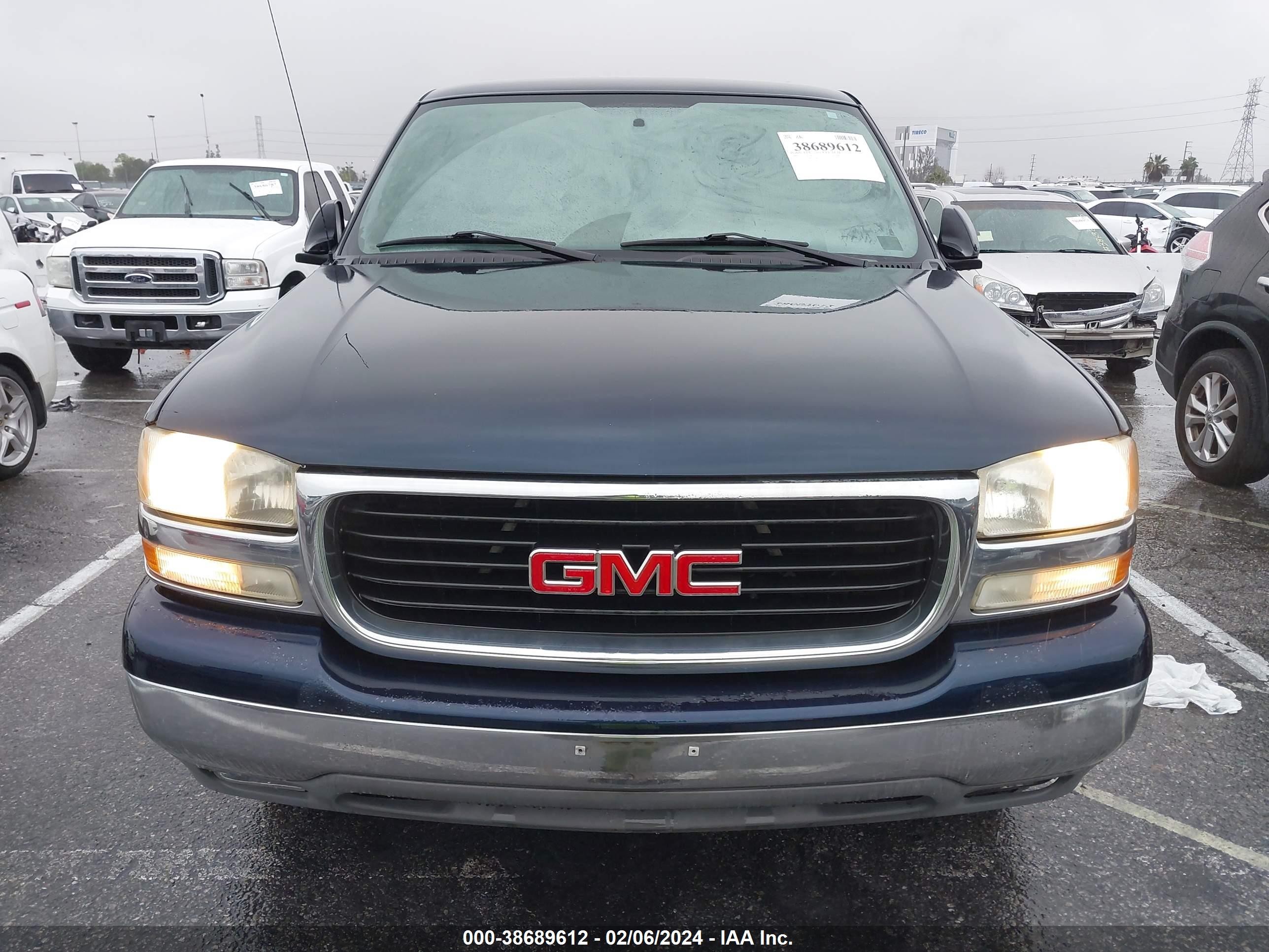 Photo 5 VIN: 1GKEC13V94R193166 - GMC YUKON 