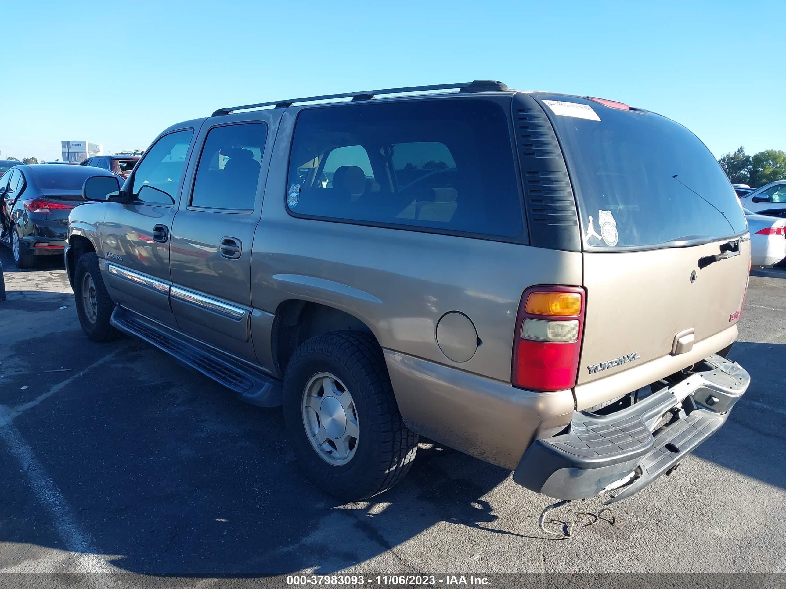 Photo 2 VIN: 1GKEC16T03J123871 - GMC YUKON 