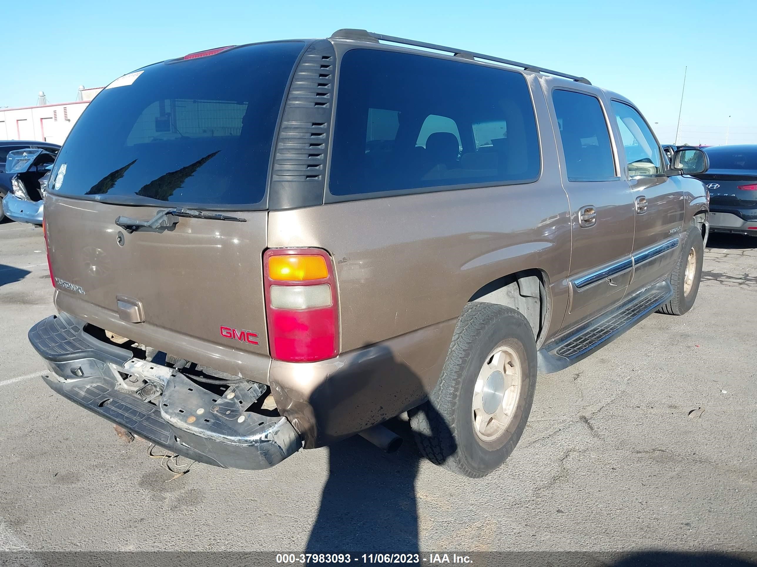 Photo 3 VIN: 1GKEC16T03J123871 - GMC YUKON 