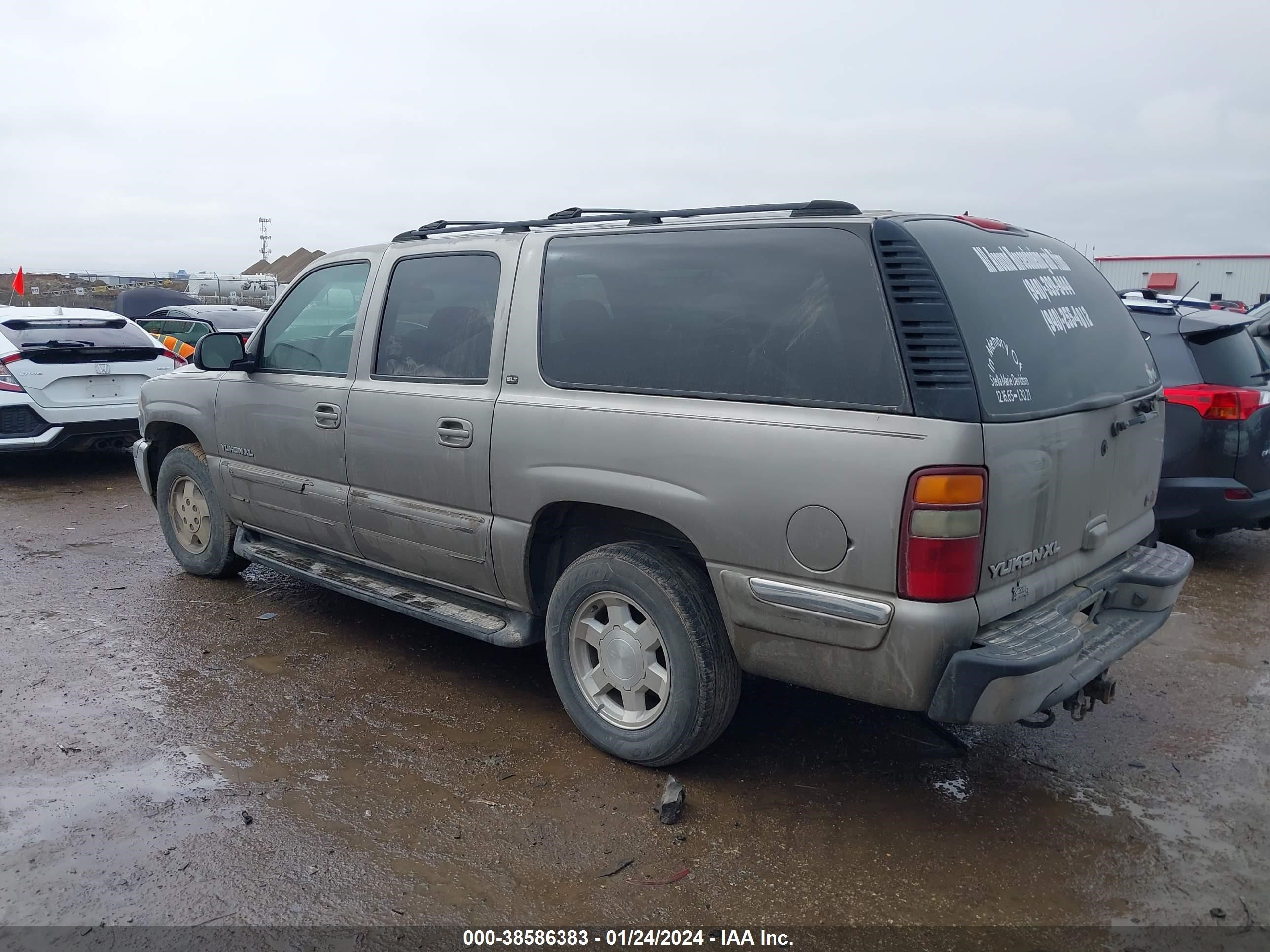 Photo 2 VIN: 1GKEC16Z22J199546 - GMC YUKON 