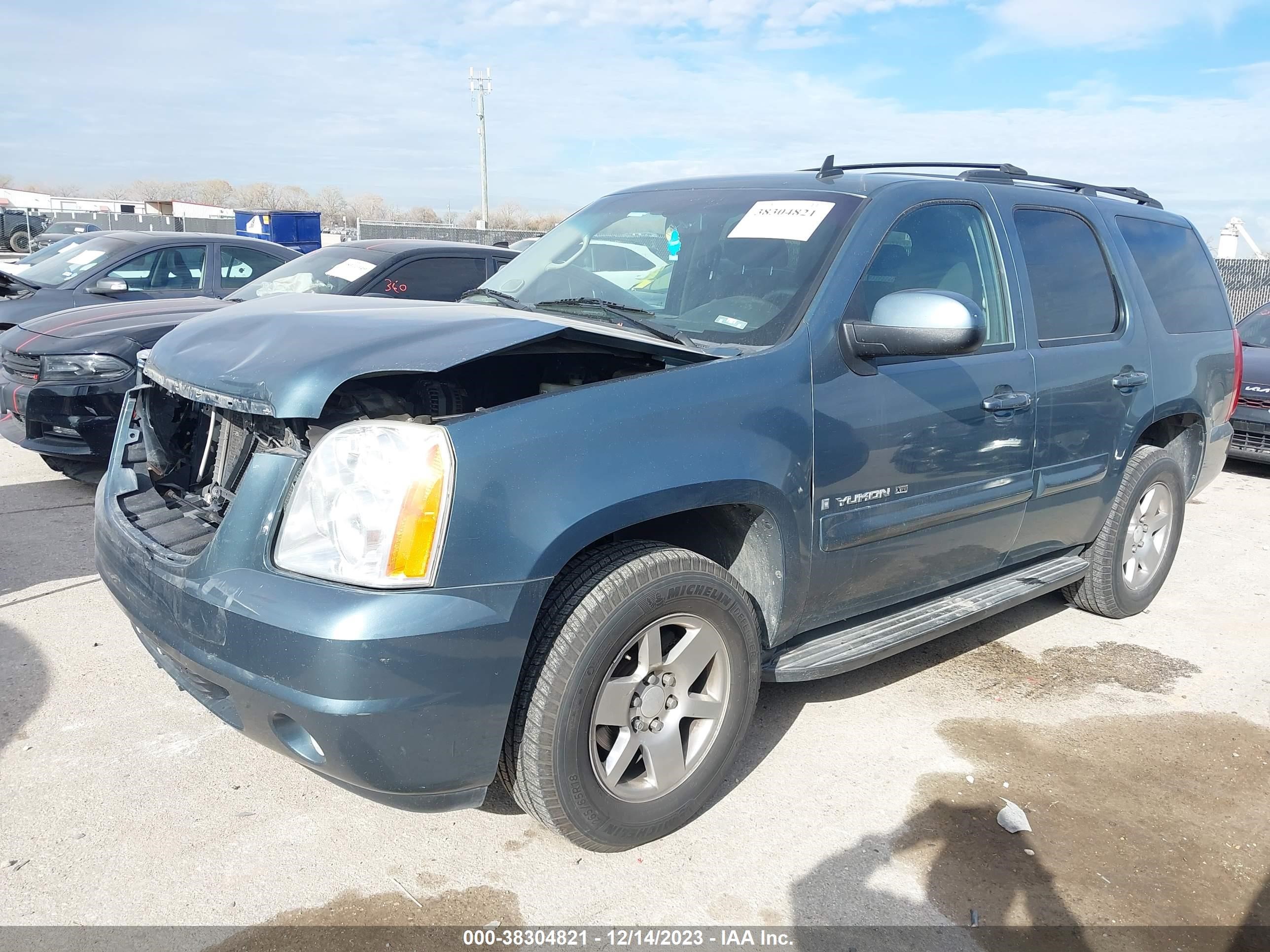 Photo 1 VIN: 1GKEC23339R154679 - GMC YUKON 