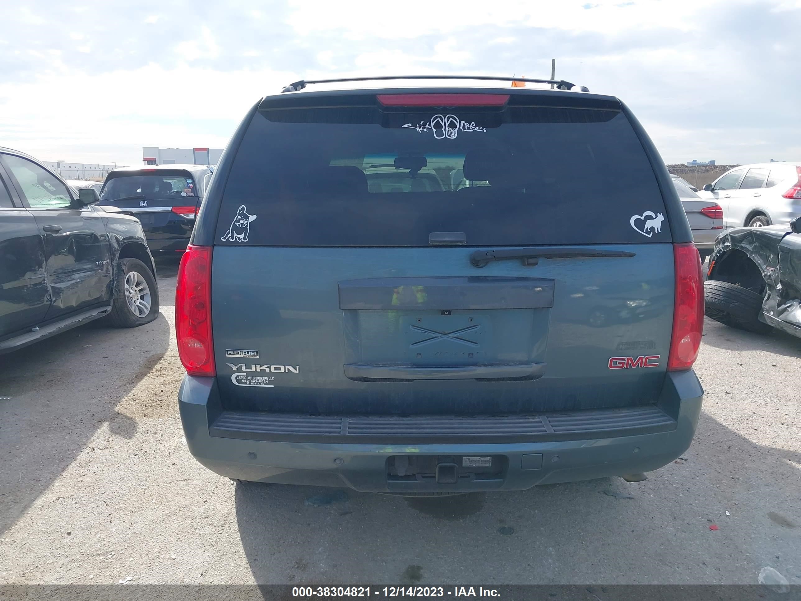 Photo 15 VIN: 1GKEC23339R154679 - GMC YUKON 