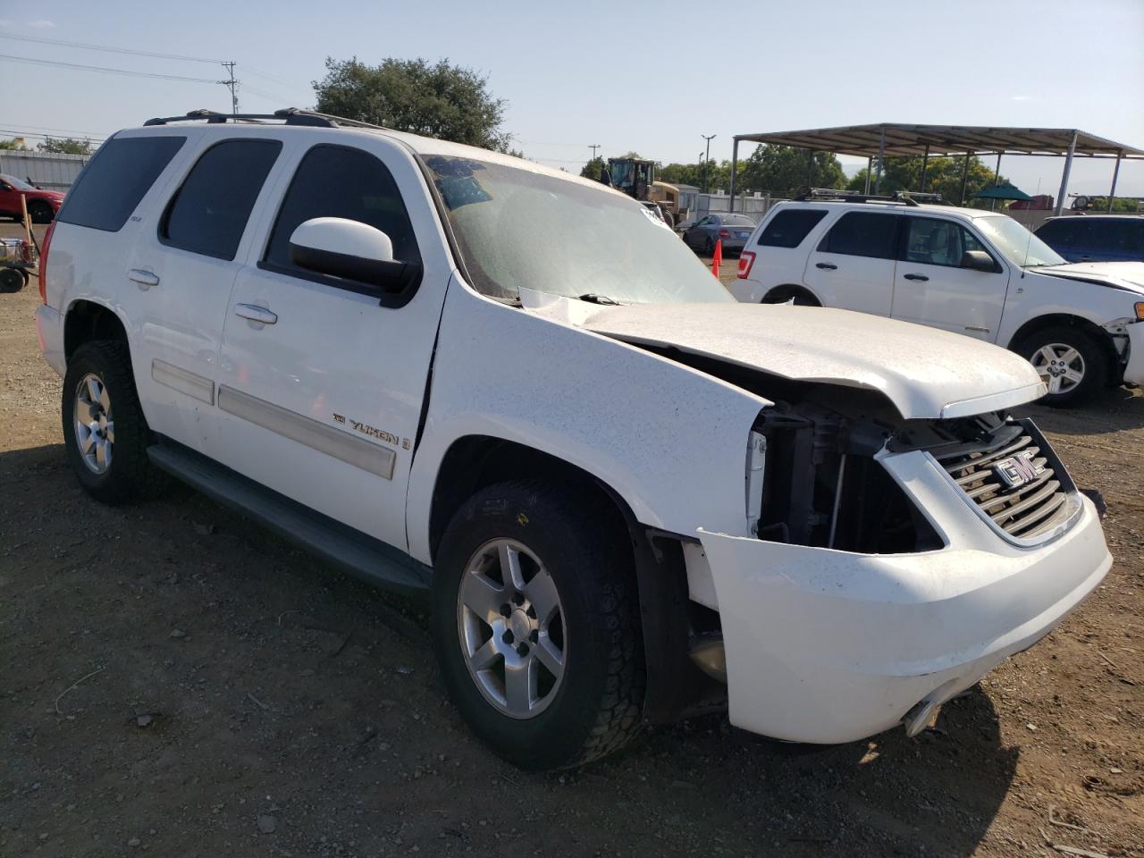 Photo 3 VIN: 1GKEC33359R238413 - GMC YUKON 