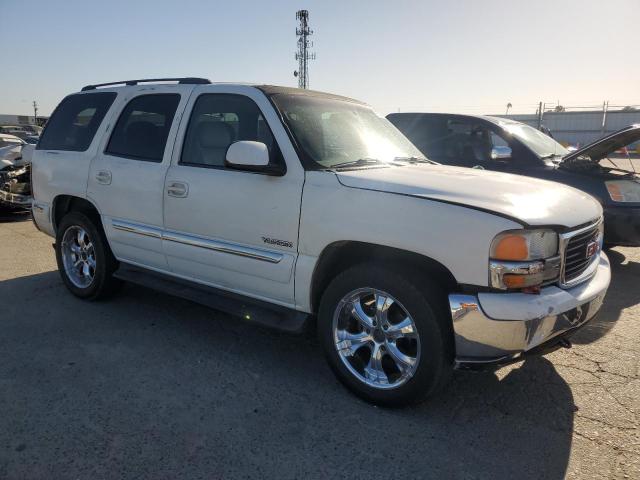 Photo 3 VIN: 1GKEK13T0YJ128891 - GMC YUKON 