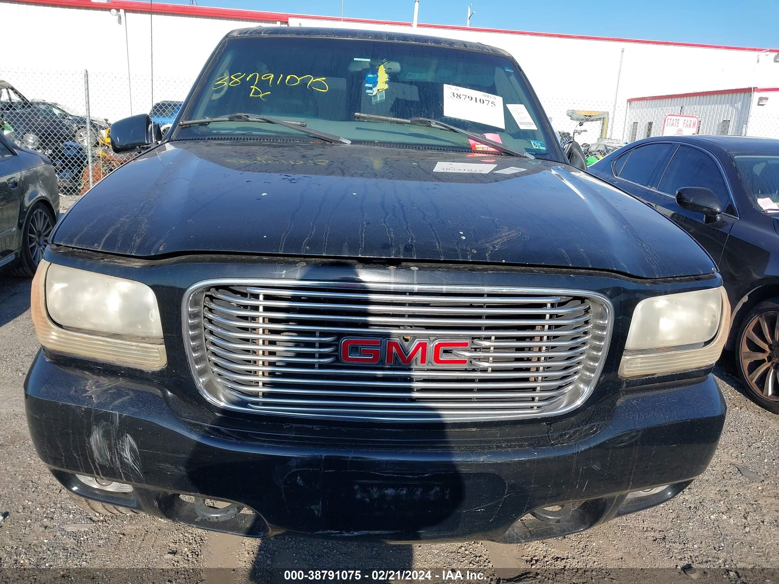 Photo 9 VIN: 1GKEK63R9YR208290 - GMC YUKON 