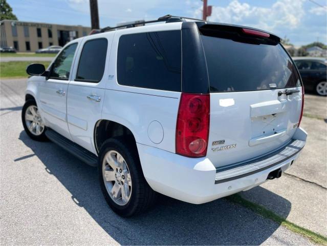 Photo 2 VIN: 1GKFC33059R157339 - GMC YUKON SLT 