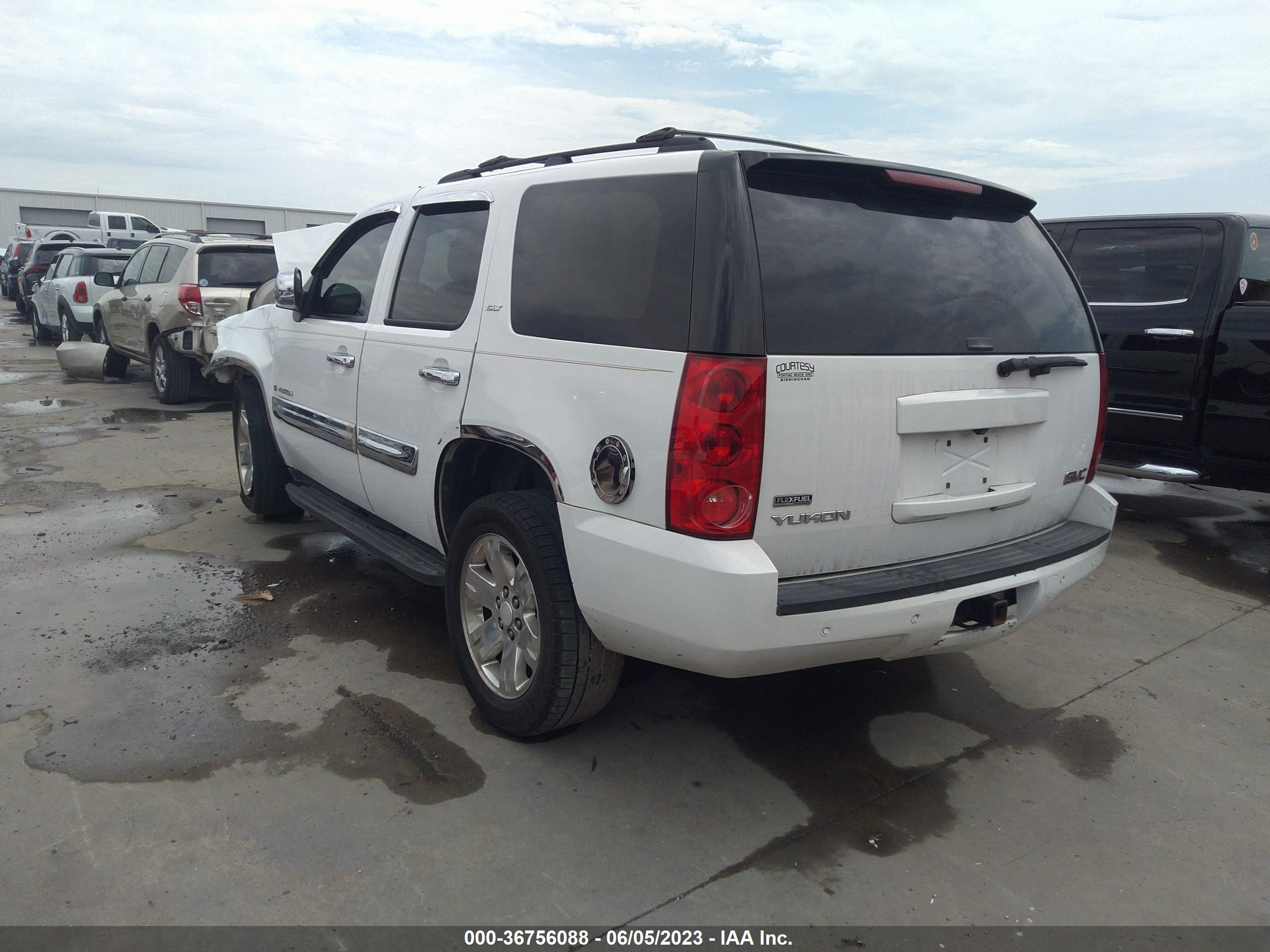 Photo 2 VIN: 1GKFC33069R109333 - GMC YUKON 