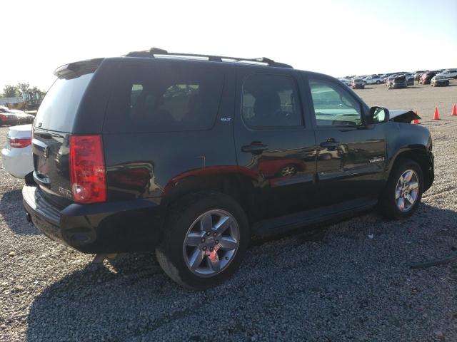 Photo 2 VIN: 1GKFC330X9R180583 - GMC YUKON SLT 