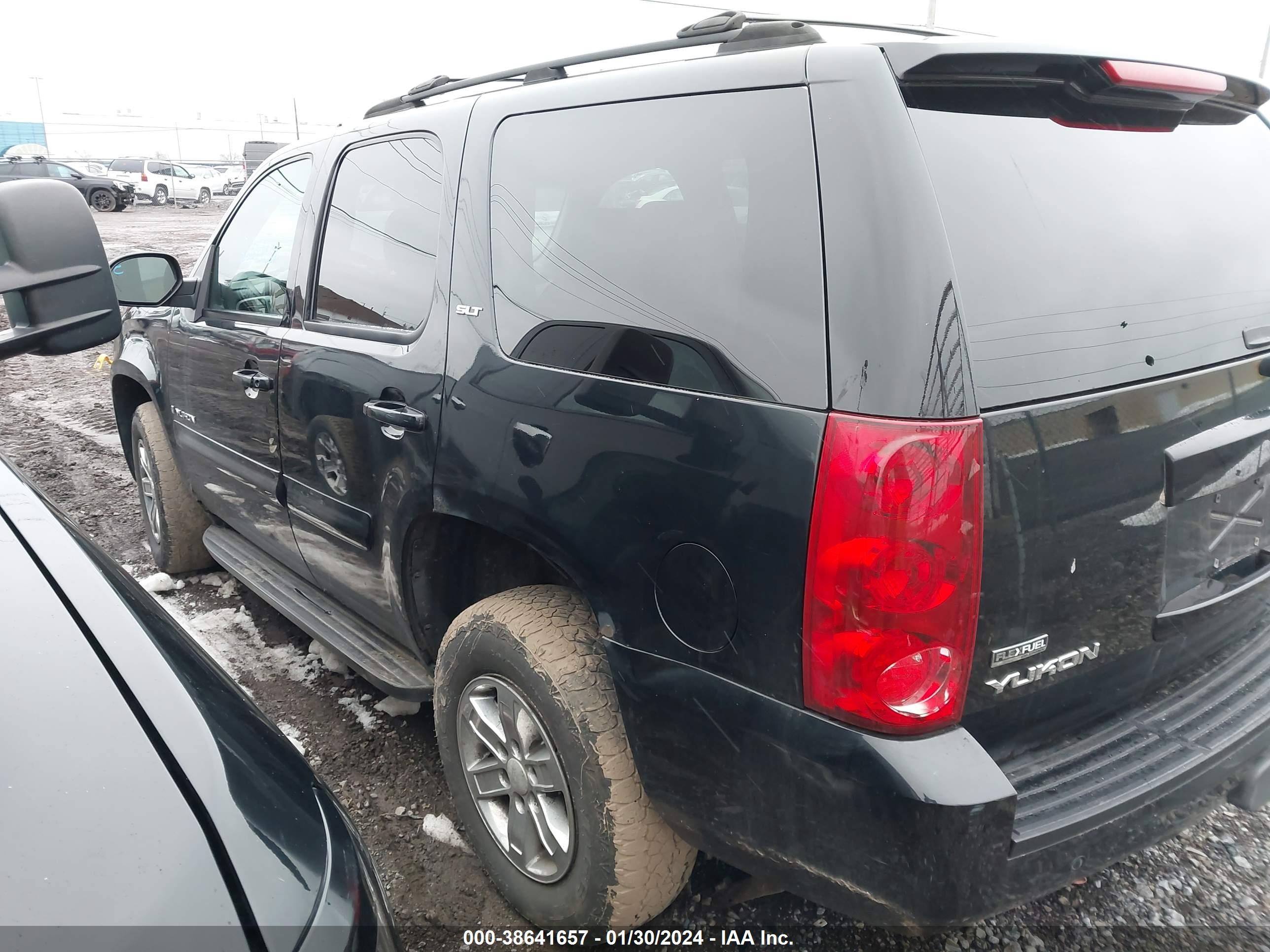 Photo 2 VIN: 1GKFK130X7R297438 - GMC YUKON 