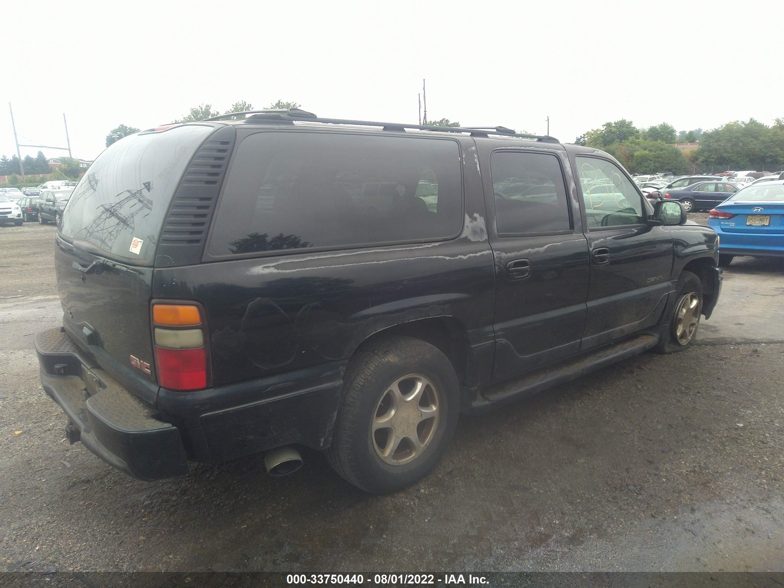 Photo 3 VIN: 1GKFK66U64J140320 - GMC YUKON 