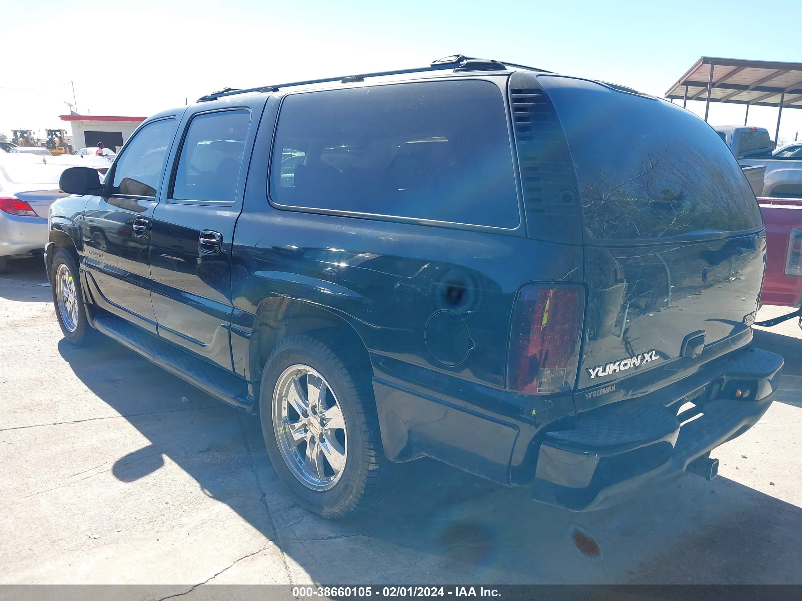 Photo 2 VIN: 1GKFK66U72J303960 - GMC YUKON 