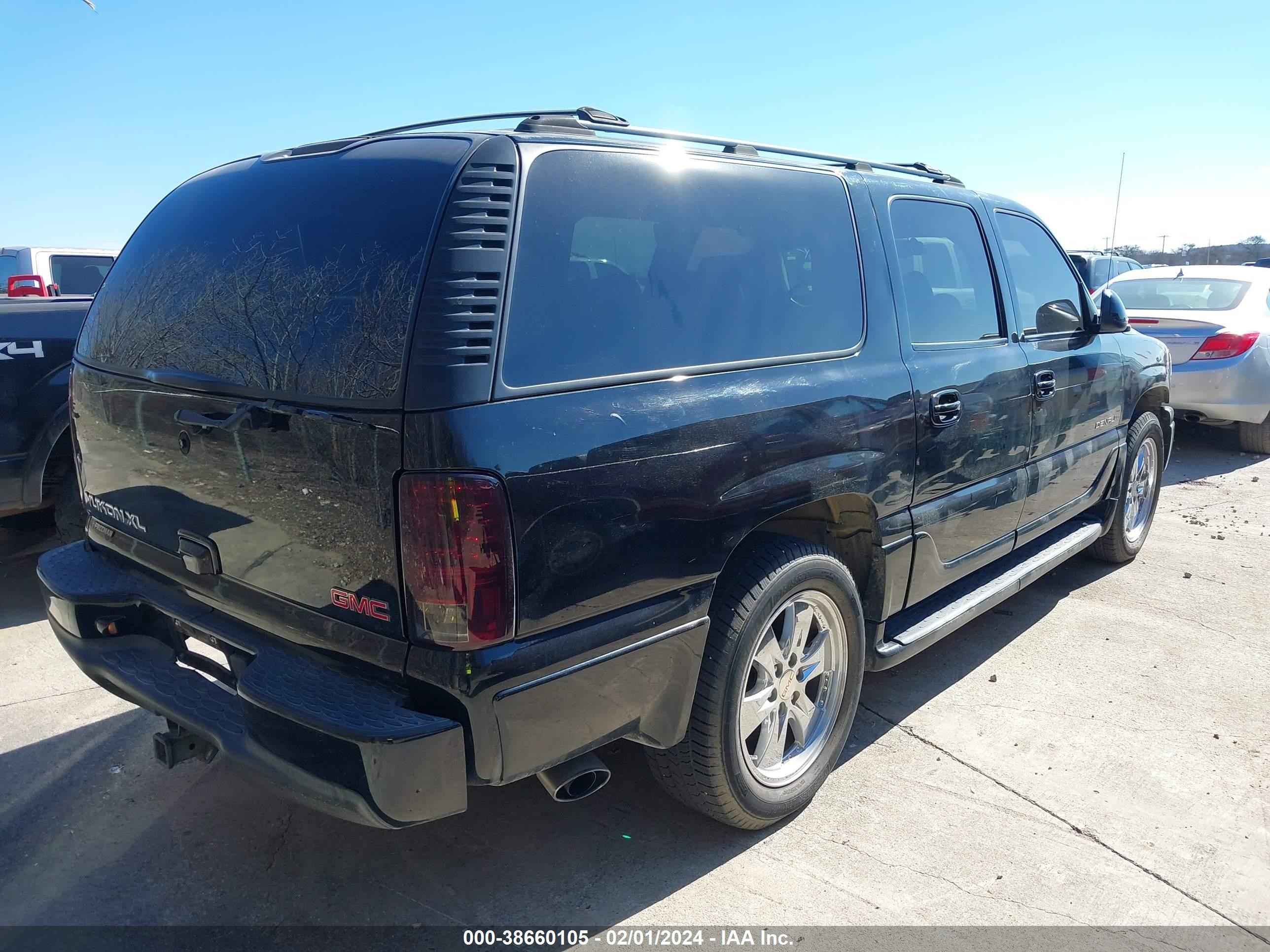 Photo 3 VIN: 1GKFK66U72J303960 - GMC YUKON 