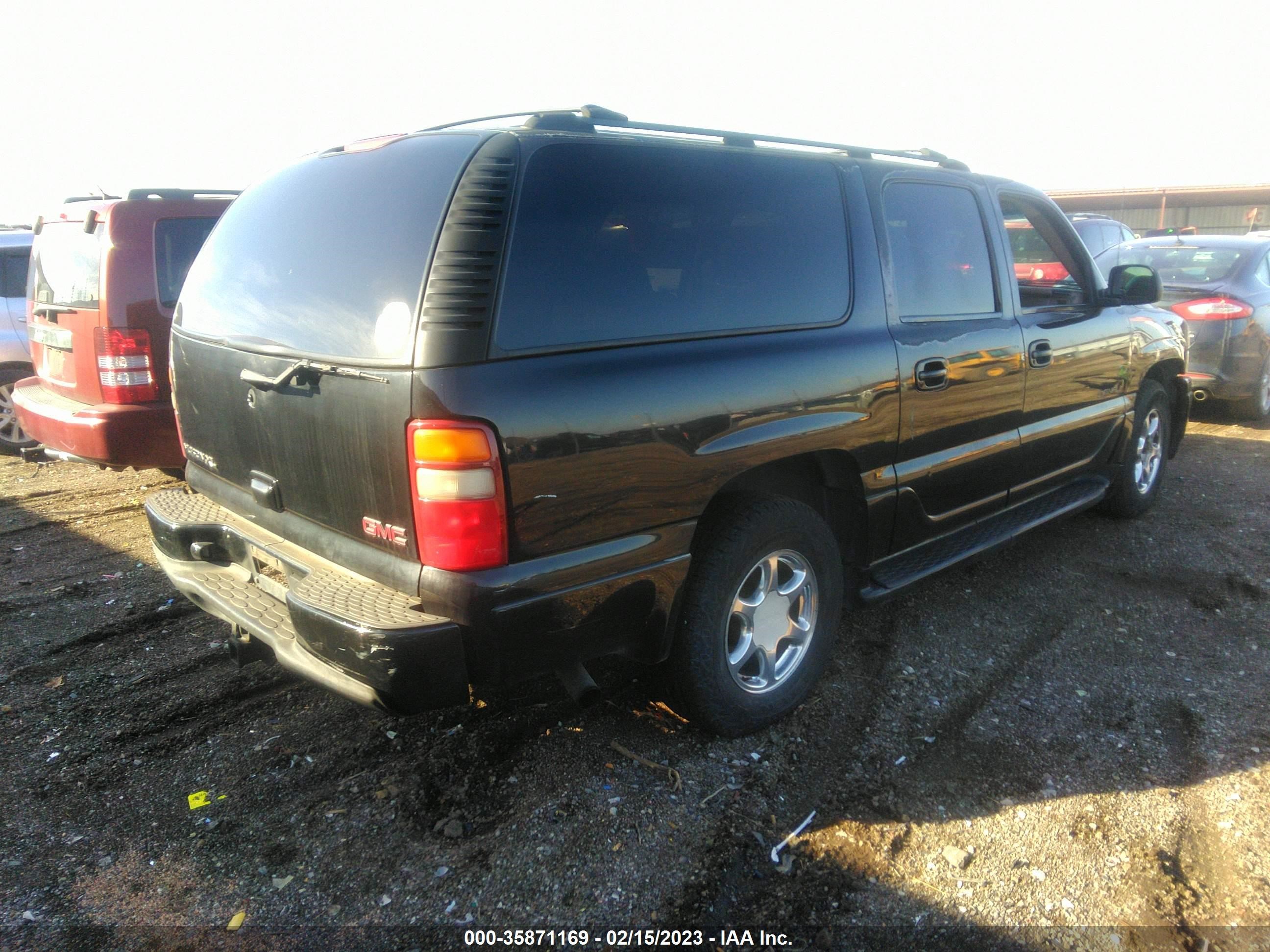 Photo 3 VIN: 1GKFK66UX3J154400 - GMC YUKON 