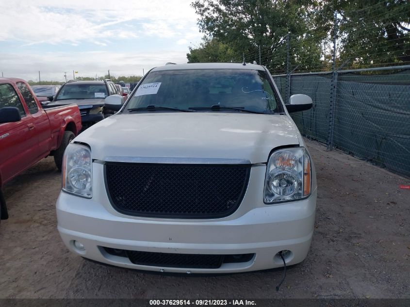 Photo 11 VIN: 1GKS1MEF9BR269479 - GMC YUKON 