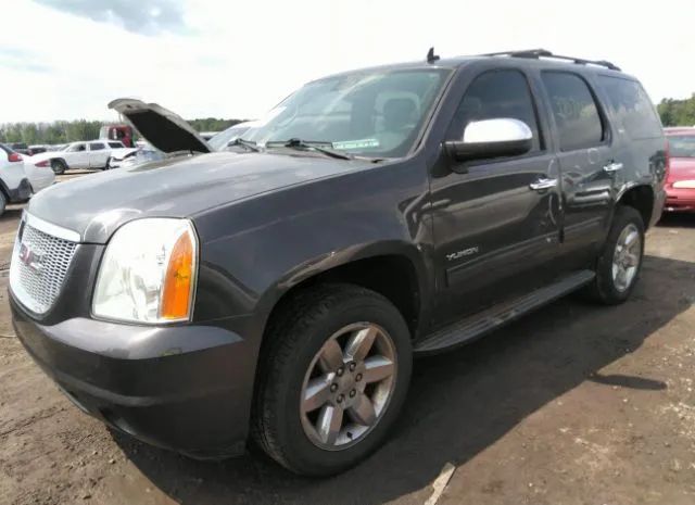 Photo 1 VIN: 1GKUKCE04AR131875 - GMC YUKON 