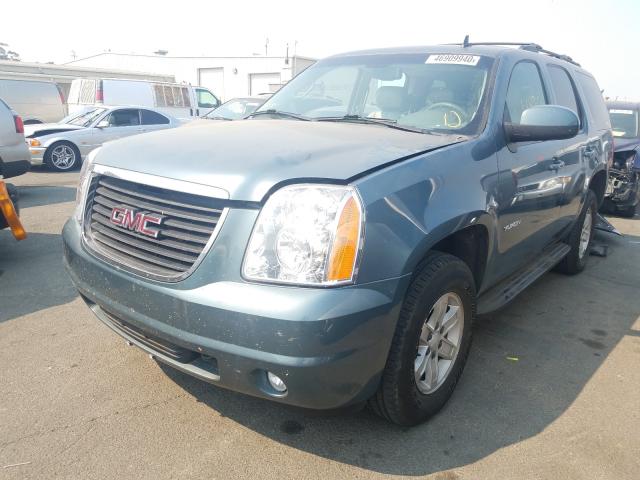 Photo 1 VIN: 1GKUKCE05AR266086 - GMC YUKON SLT 