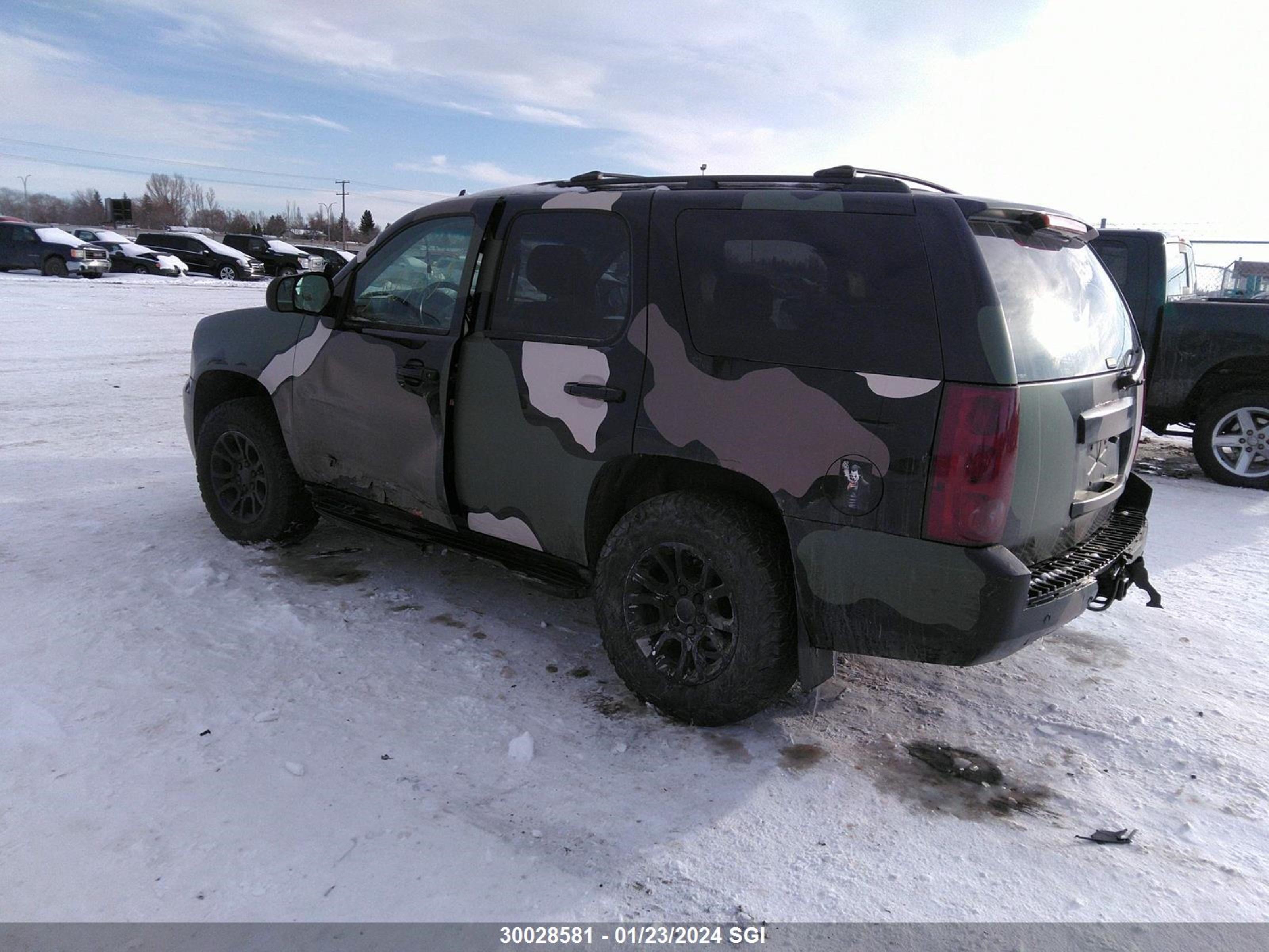 Photo 2 VIN: 1GKUKCE08AR136335 - GMC YUKON 