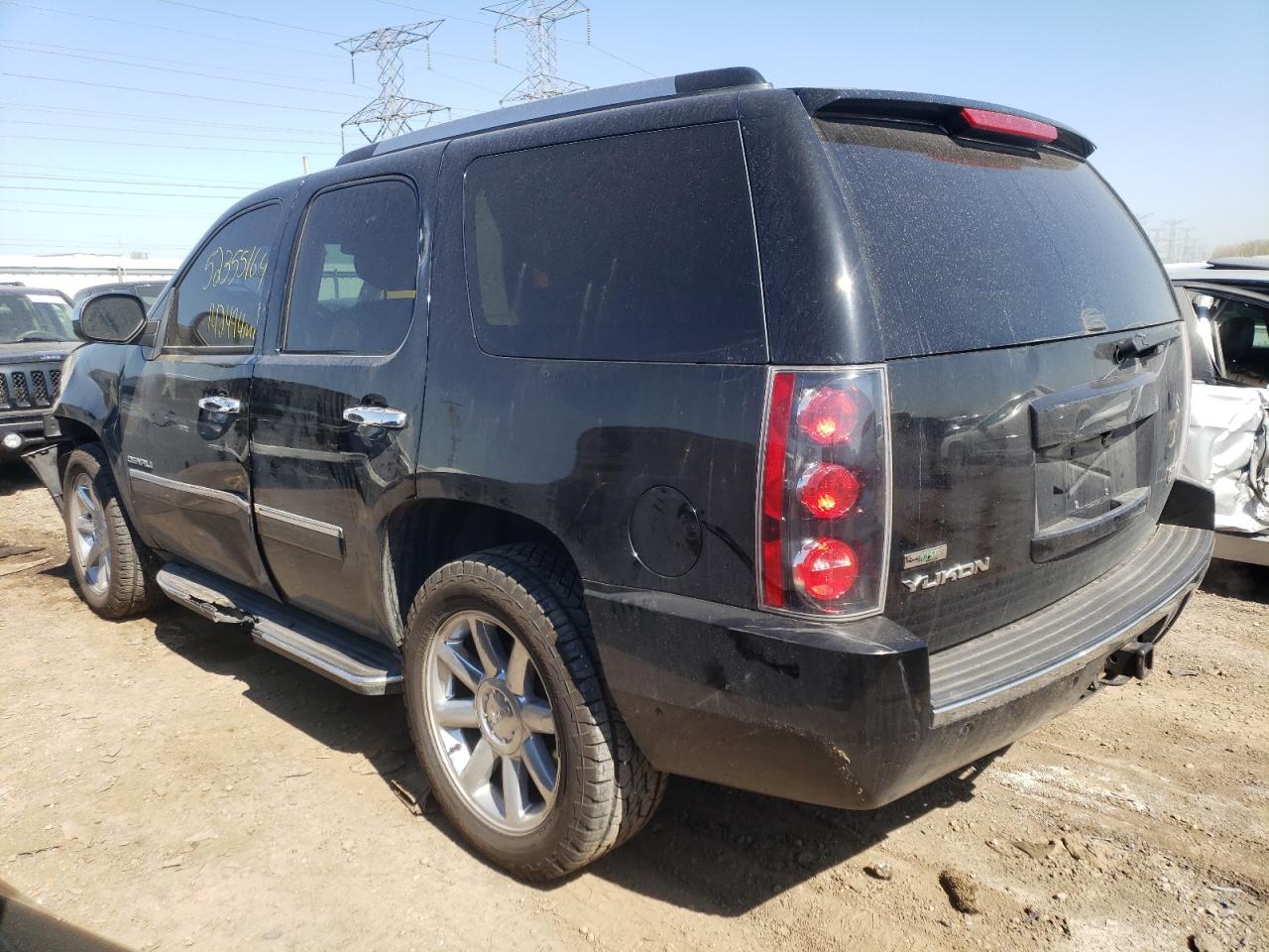 Photo 1 VIN: 1GKUKEEF4AR230325 - GMC YUKON 