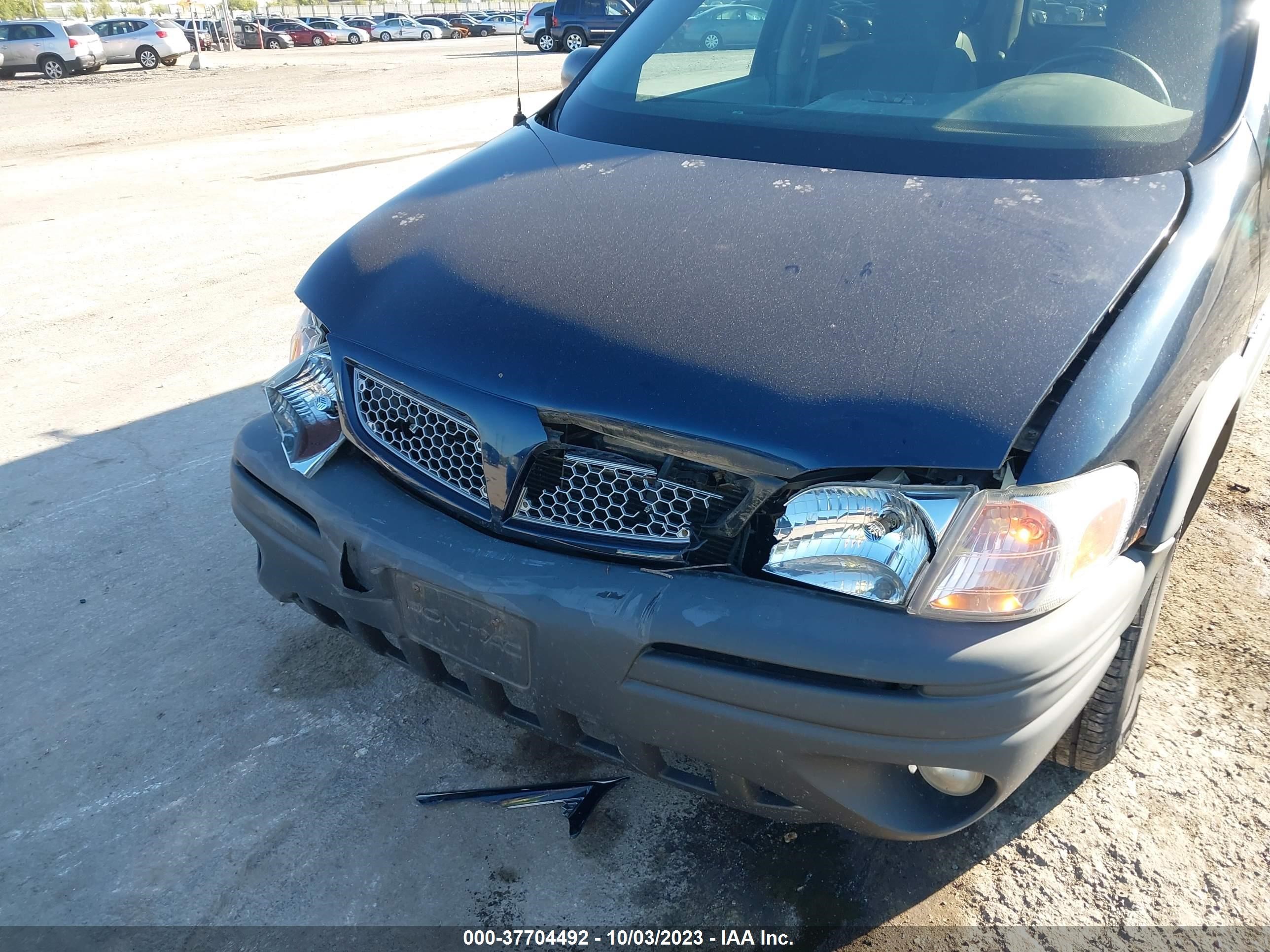 Photo 5 VIN: 1GMDV33EX5D104812 - PONTIAC MONTANA 