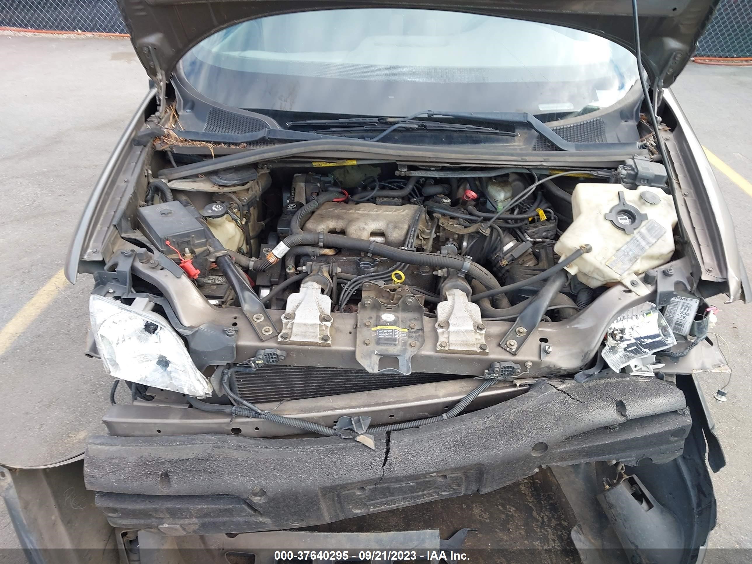 Photo 9 VIN: 1GMDX03E24D220450 - PONTIAC MONTANA 