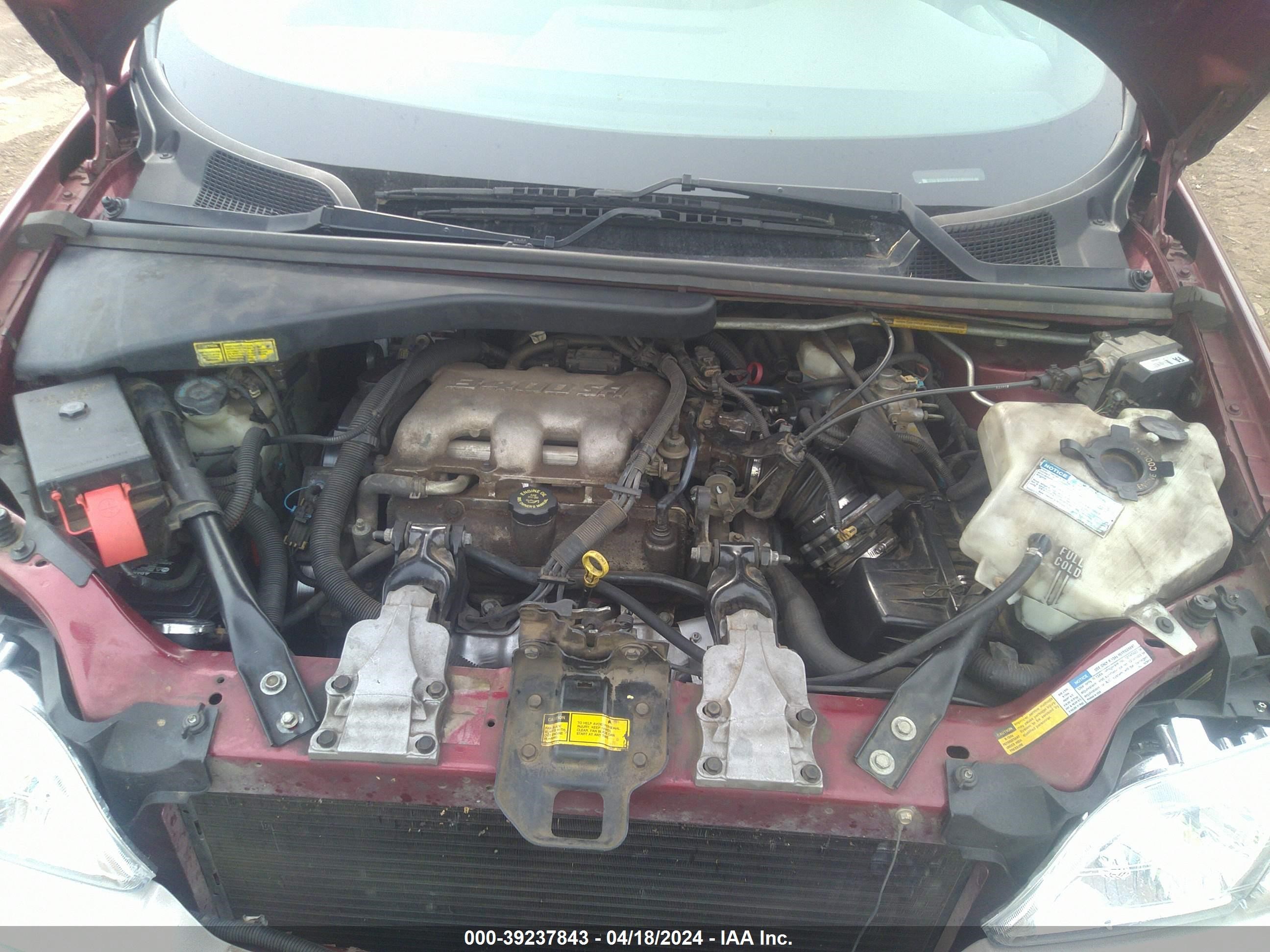 Photo 9 VIN: 1GMDX03E5XD330199 - PONTIAC MONTANA 