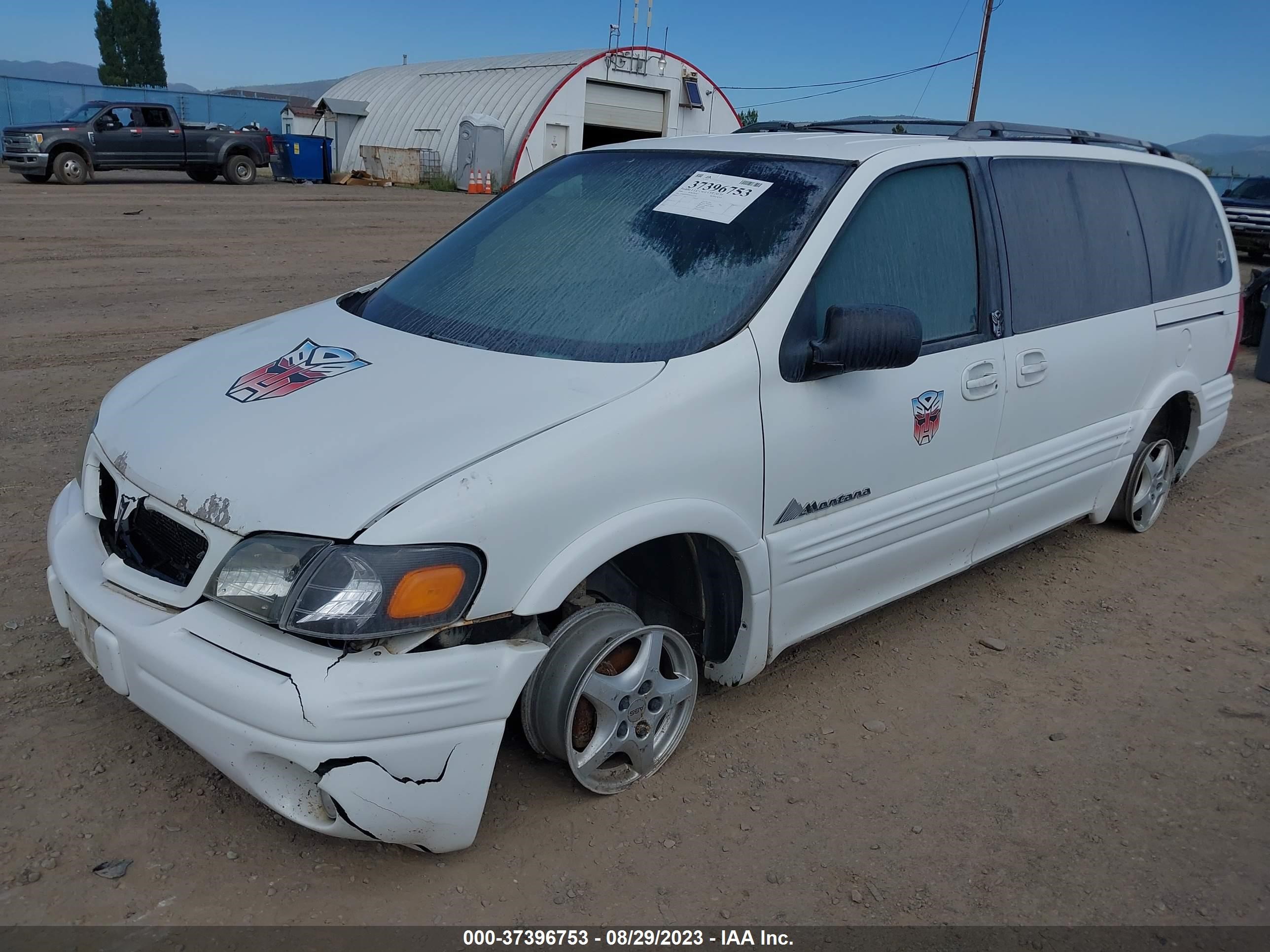 Photo 1 VIN: 1GMDX03E9XD152149 - PONTIAC MONTANA 