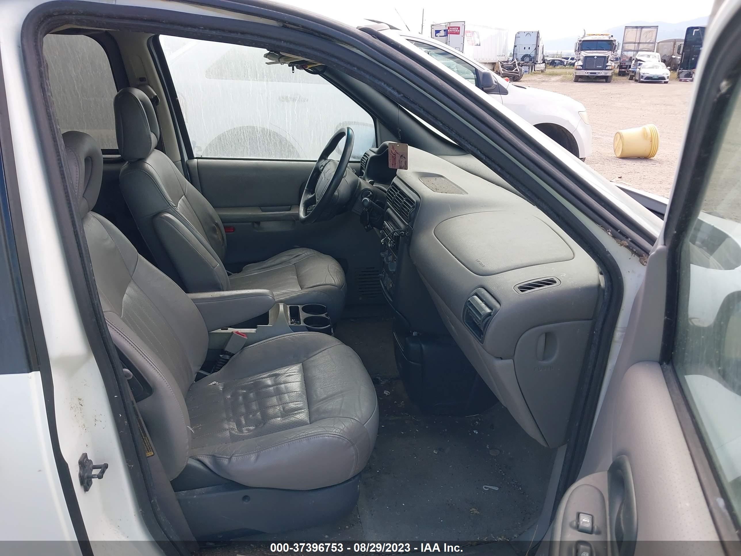 Photo 4 VIN: 1GMDX03E9XD152149 - PONTIAC MONTANA 