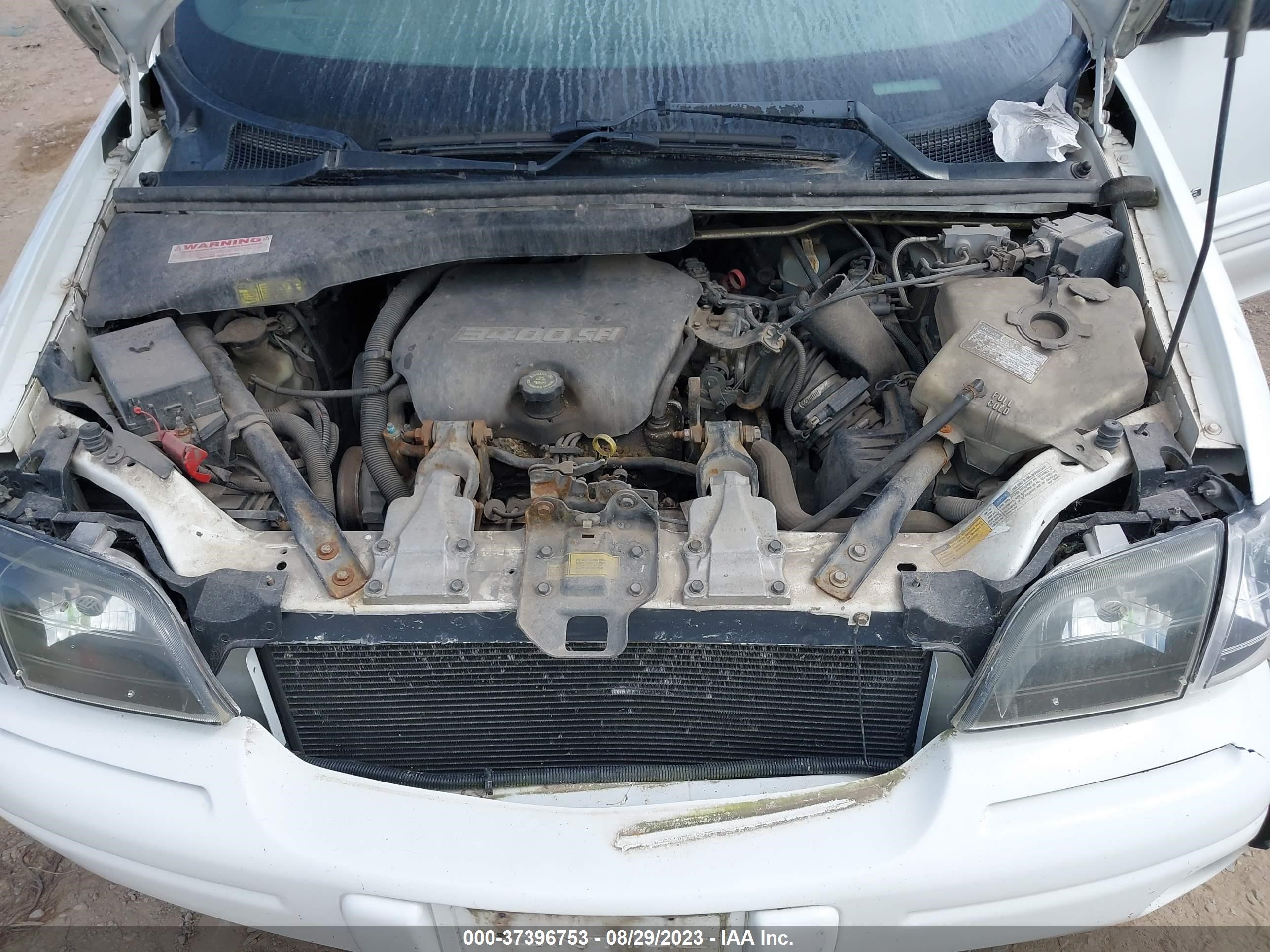 Photo 9 VIN: 1GMDX03E9XD152149 - PONTIAC MONTANA 