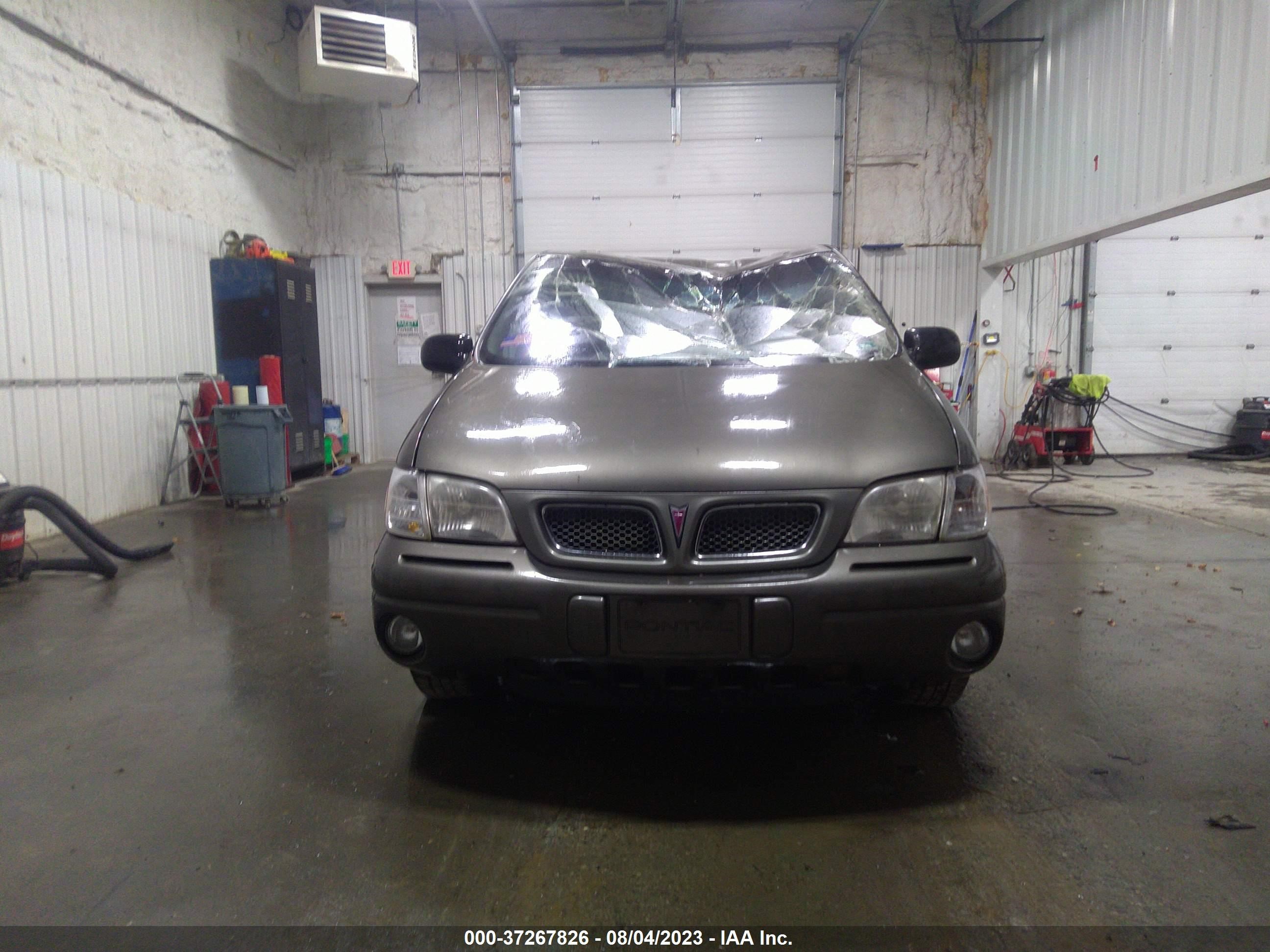 Photo 11 VIN: 1GMDX03EXWD231702 - PONTIAC TRANS SPORT 