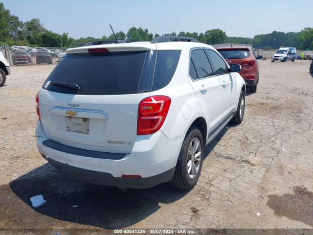 Photo 3 VIN: 1GNALCEKXGZ100787 - CHEVROLET EQUINOX 