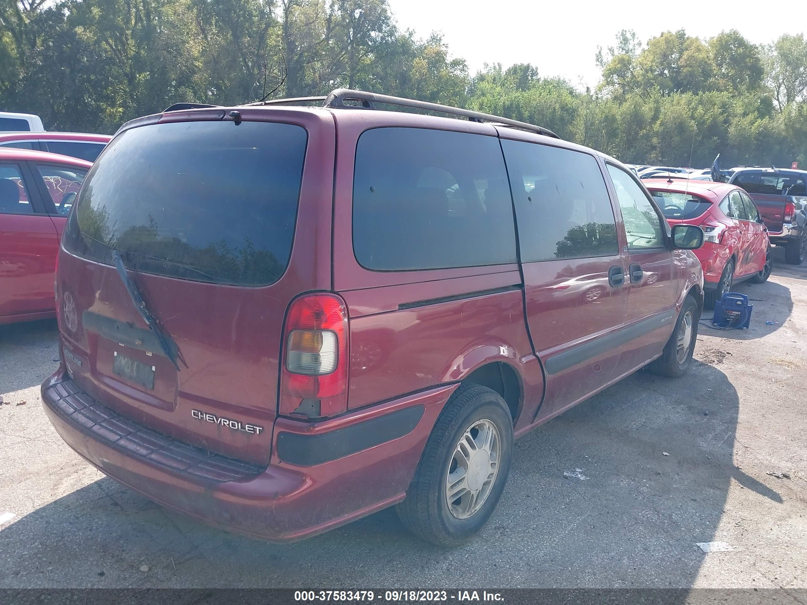 Photo 3 VIN: 1GNDX03EX2D199999 - CHEVROLET VENTURE 