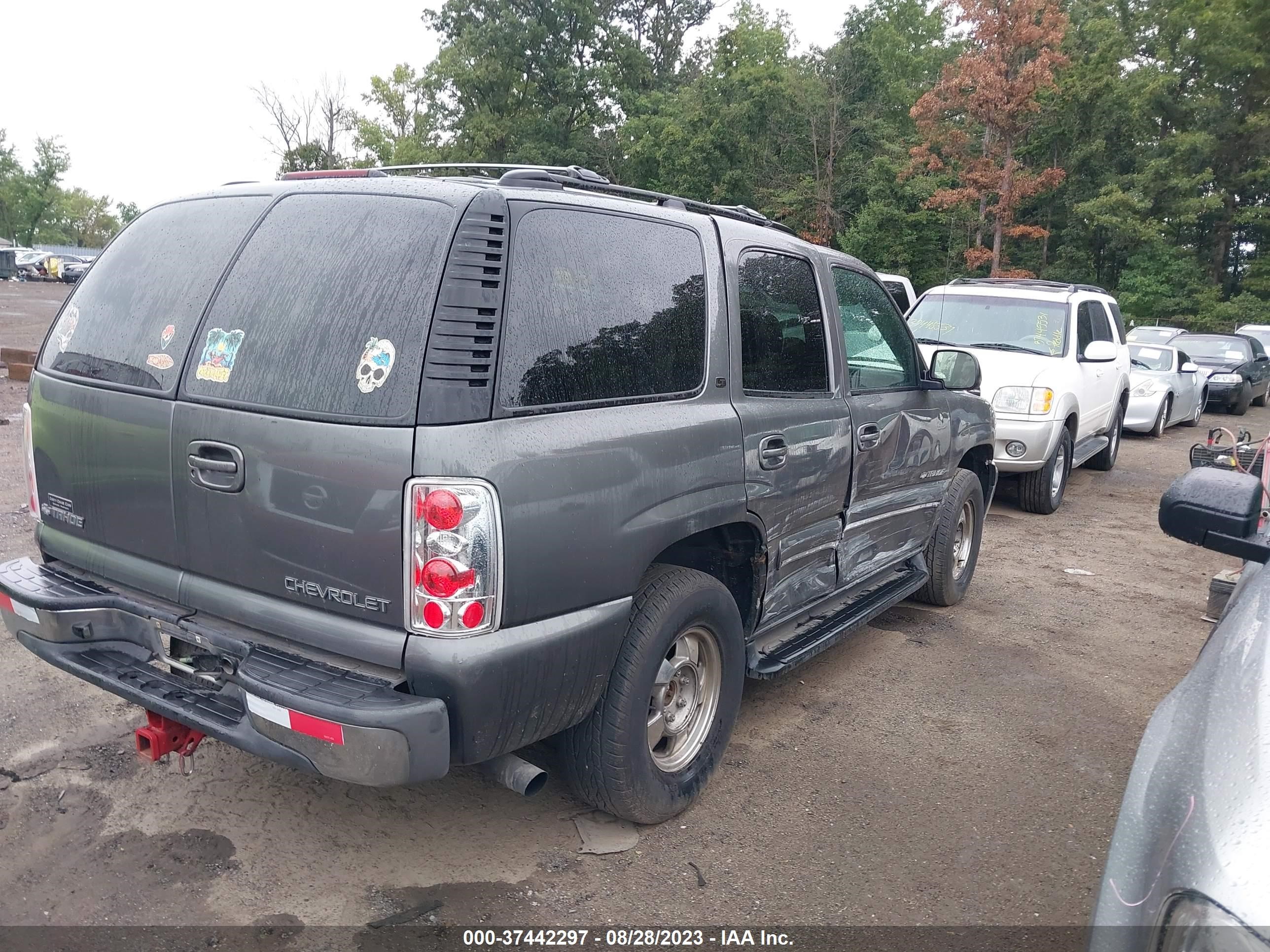 Photo 3 VIN: 1GNEK13T3YJ106368 - CHEVROLET TAHOE 