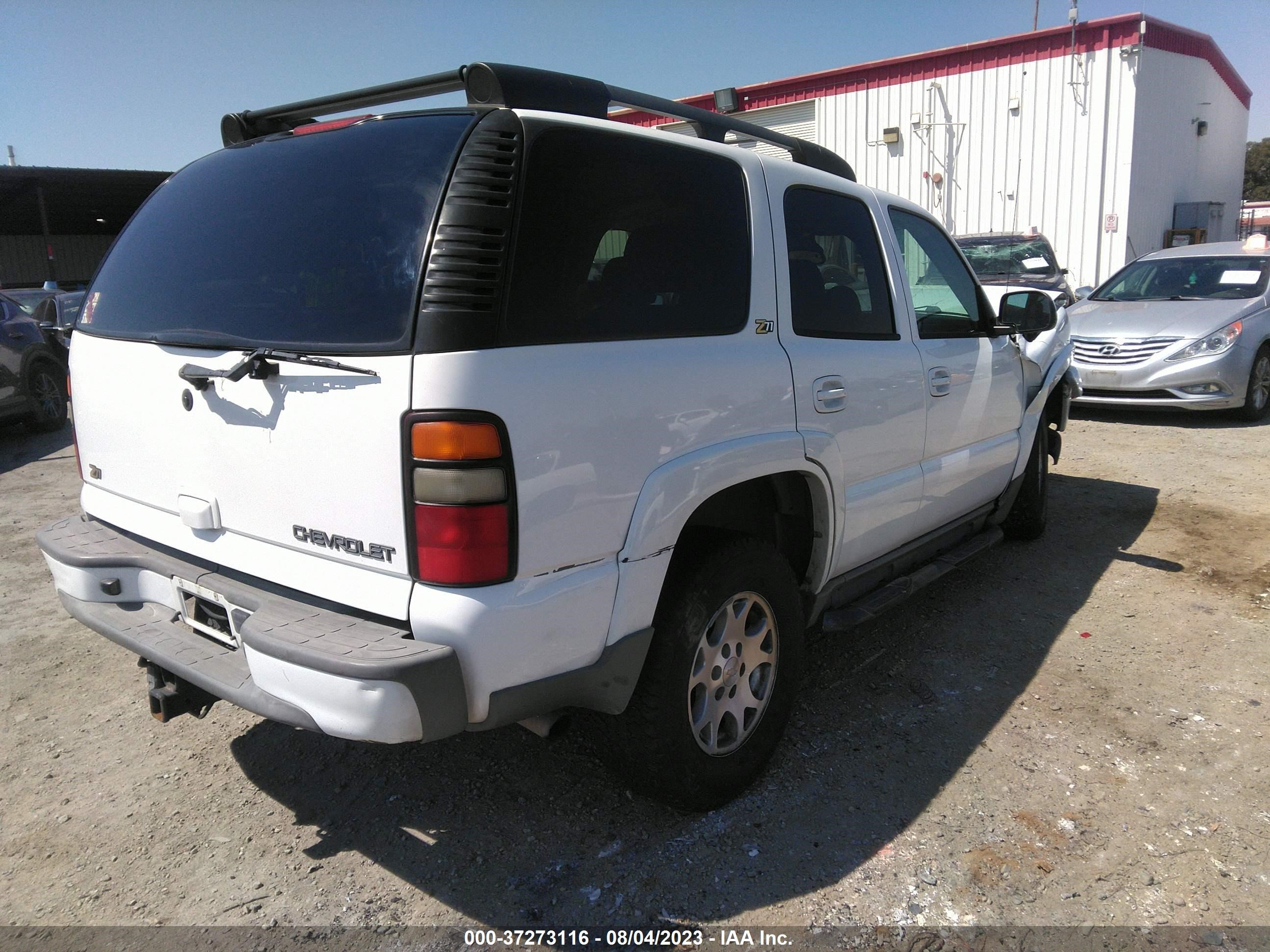 Photo 3 VIN: 1GNEK13T84R147879 - CHEVROLET TAHOE 