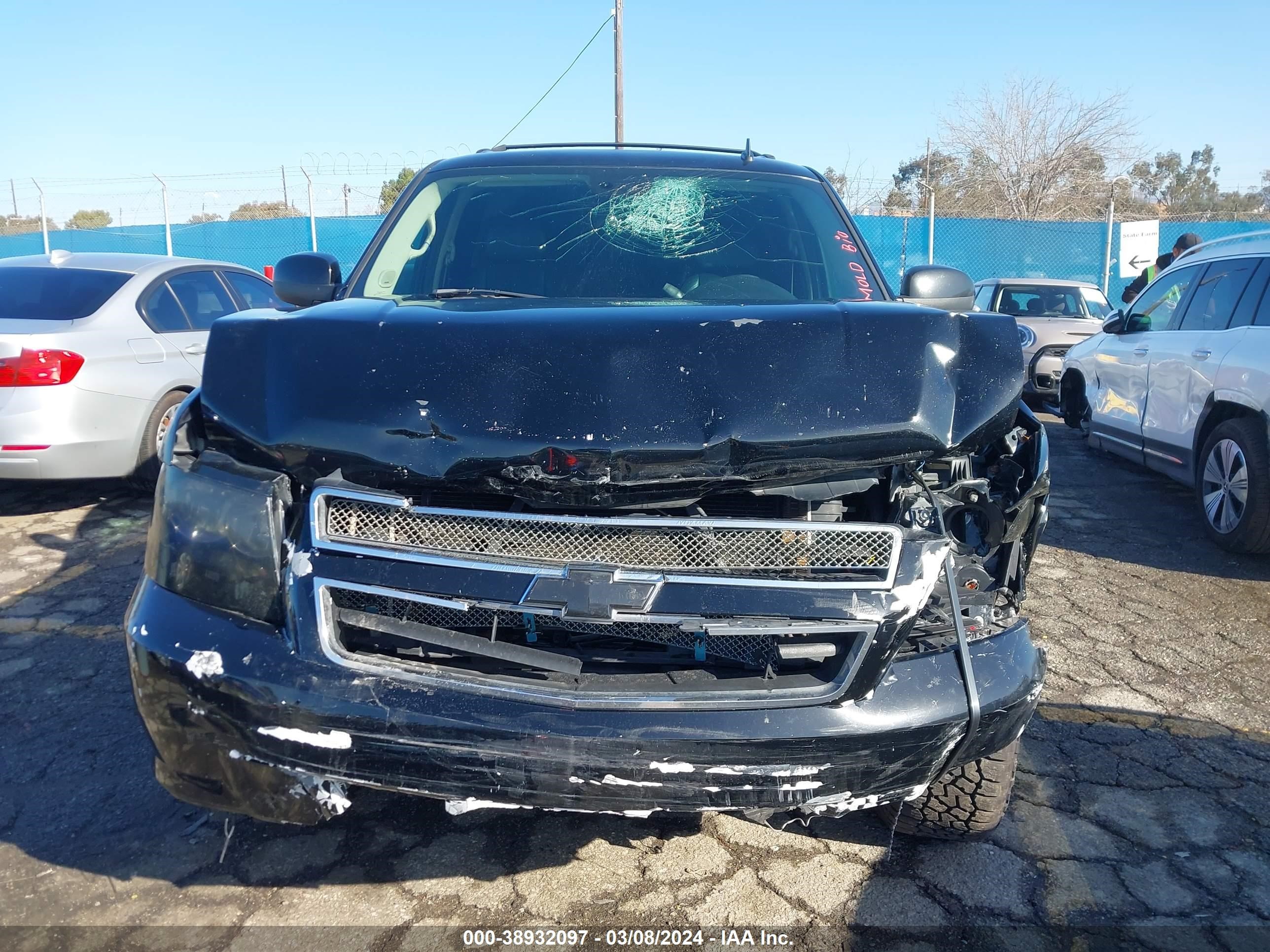 Photo 12 VIN: 1GNFC13027R173017 - CHEVROLET TAHOE 