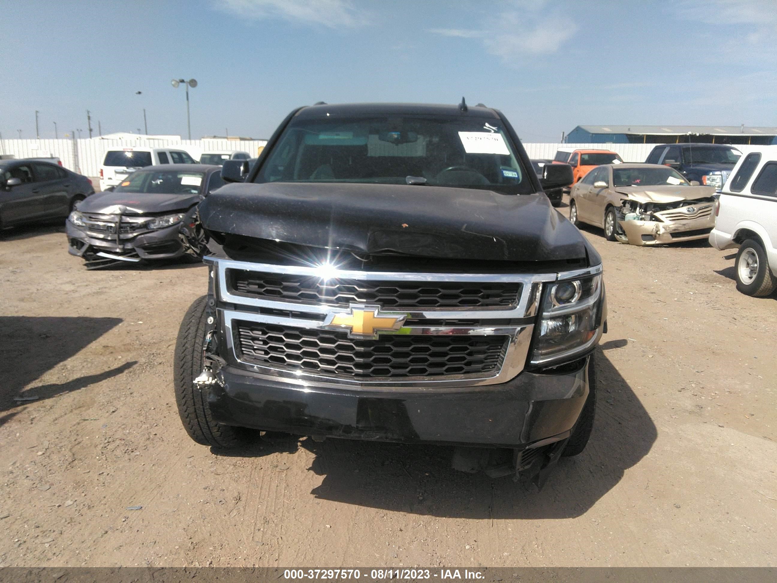 Photo 11 VIN: 1GNSCAEC4HR280772 - CHEVROLET TAHOE 