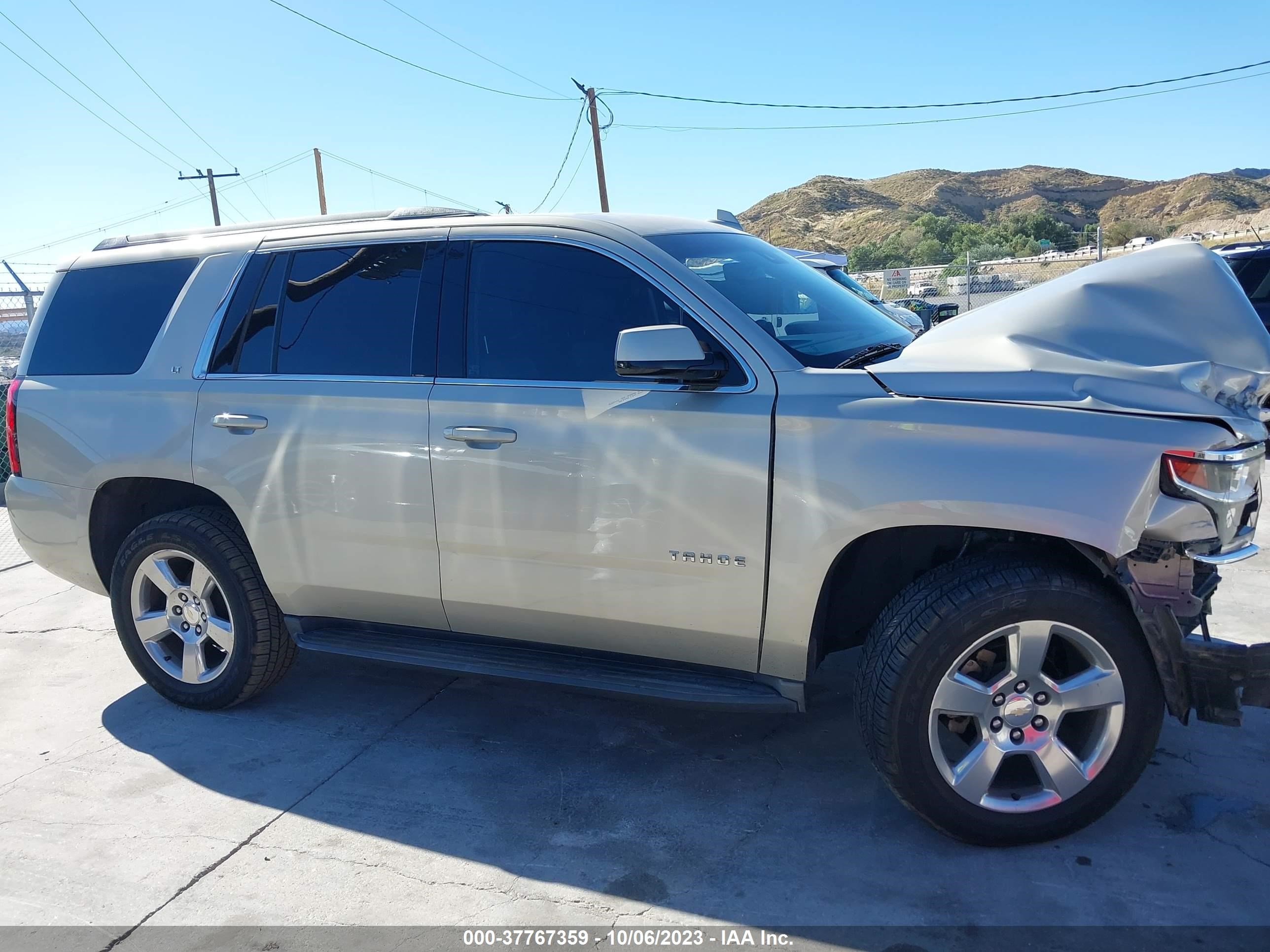 Photo 12 VIN: 1GNSCBKC7FR740269 - CHEVROLET TAHOE 