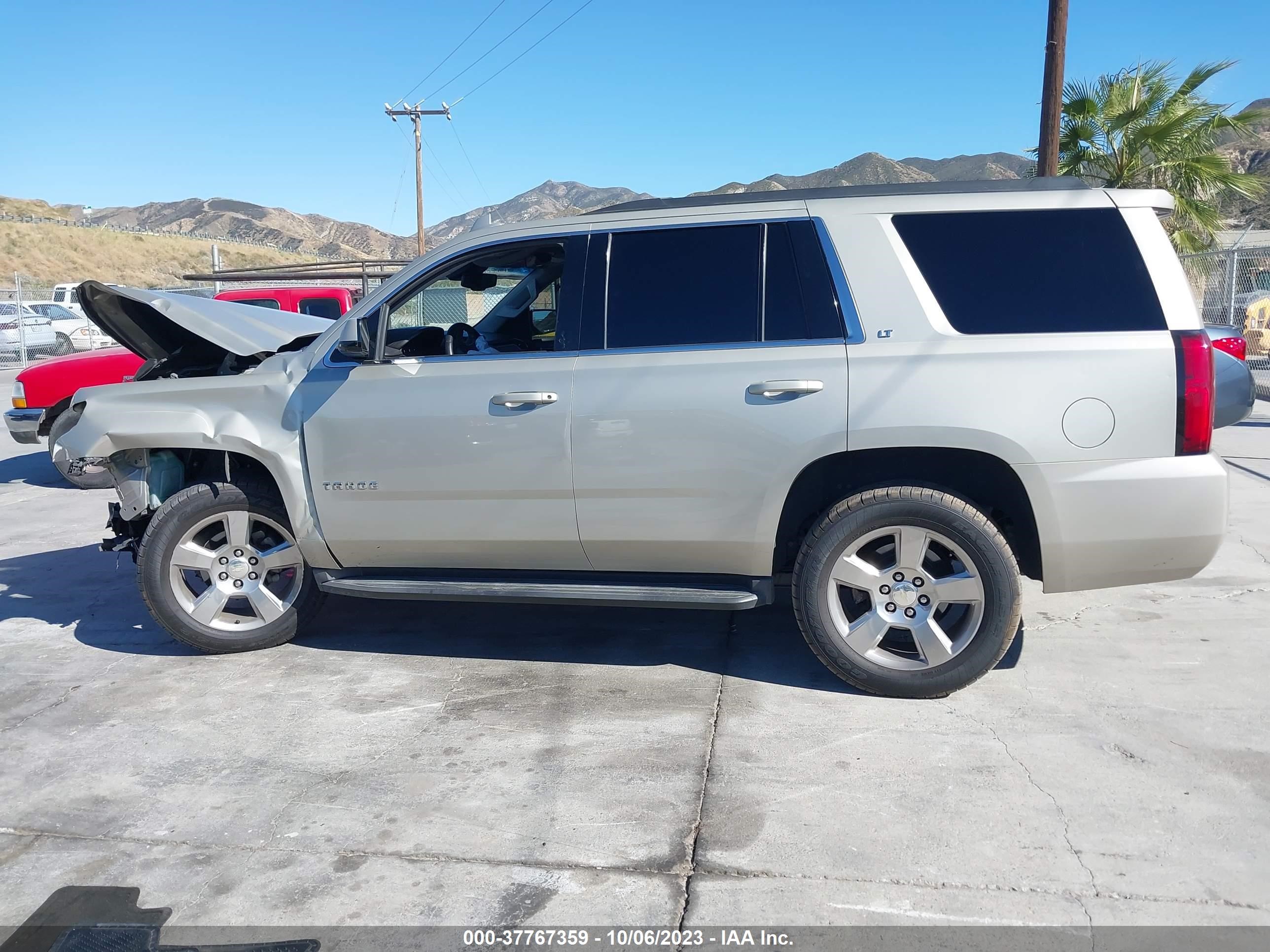 Photo 13 VIN: 1GNSCBKC7FR740269 - CHEVROLET TAHOE 