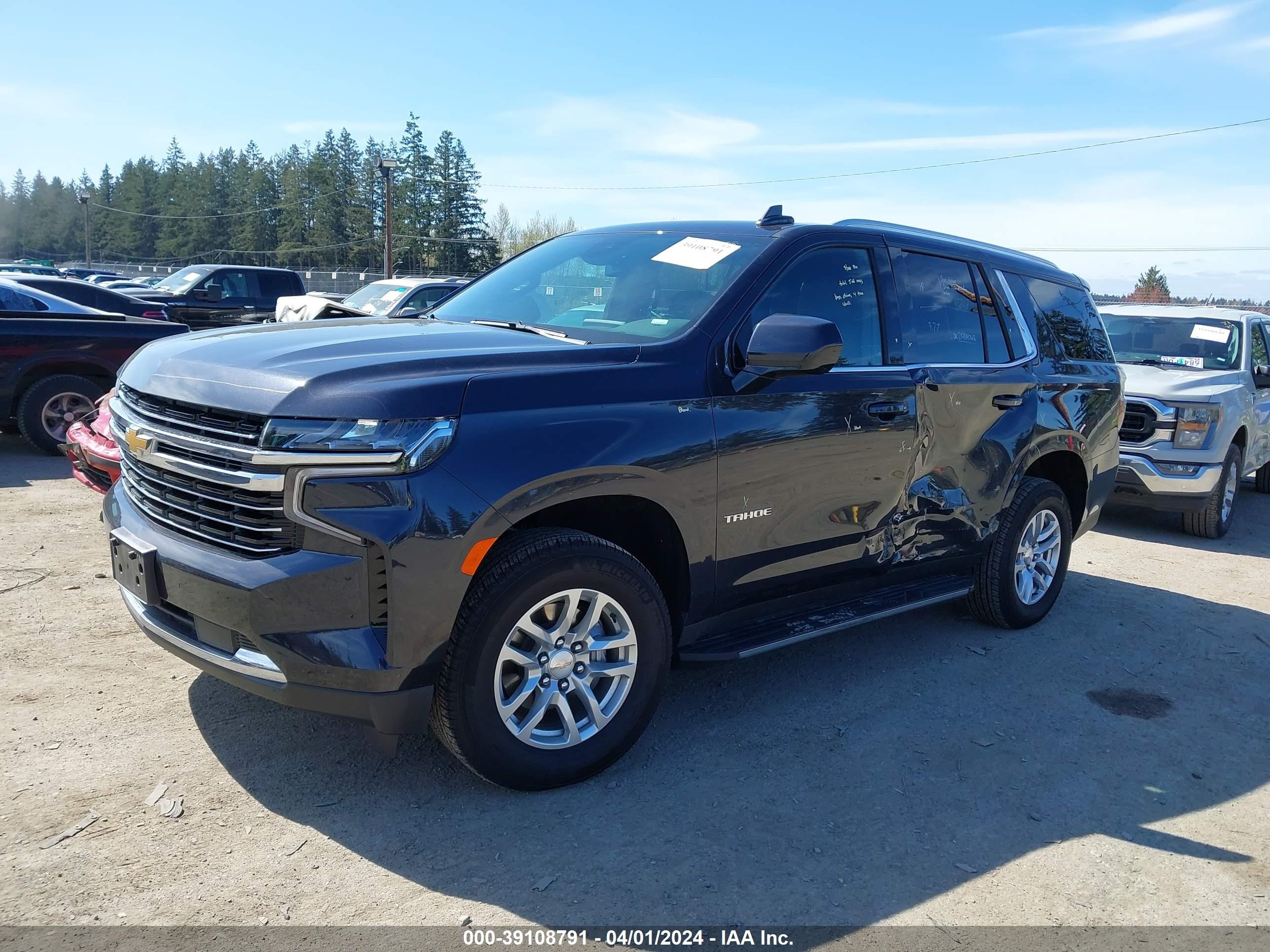 Photo 1 VIN: 1GNSCNKD5PR434912 - CHEVROLET TAHOE 