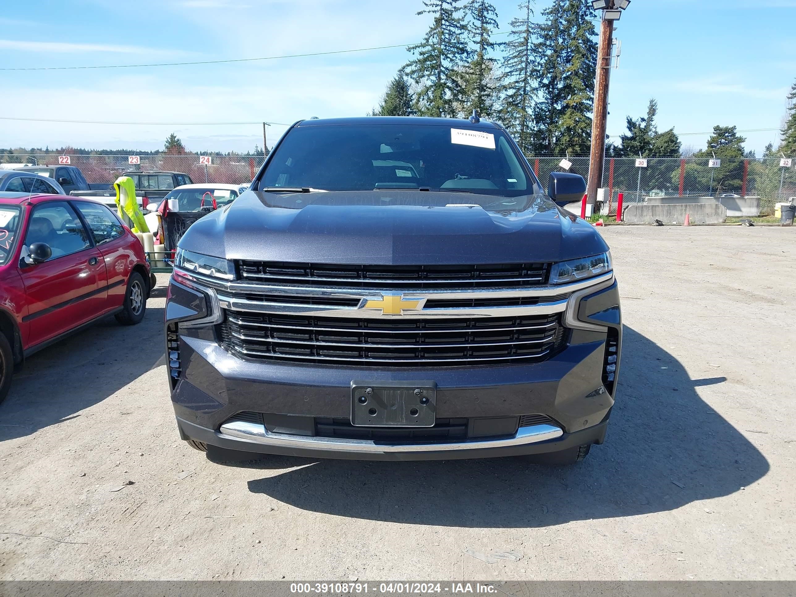 Photo 11 VIN: 1GNSCNKD5PR434912 - CHEVROLET TAHOE 