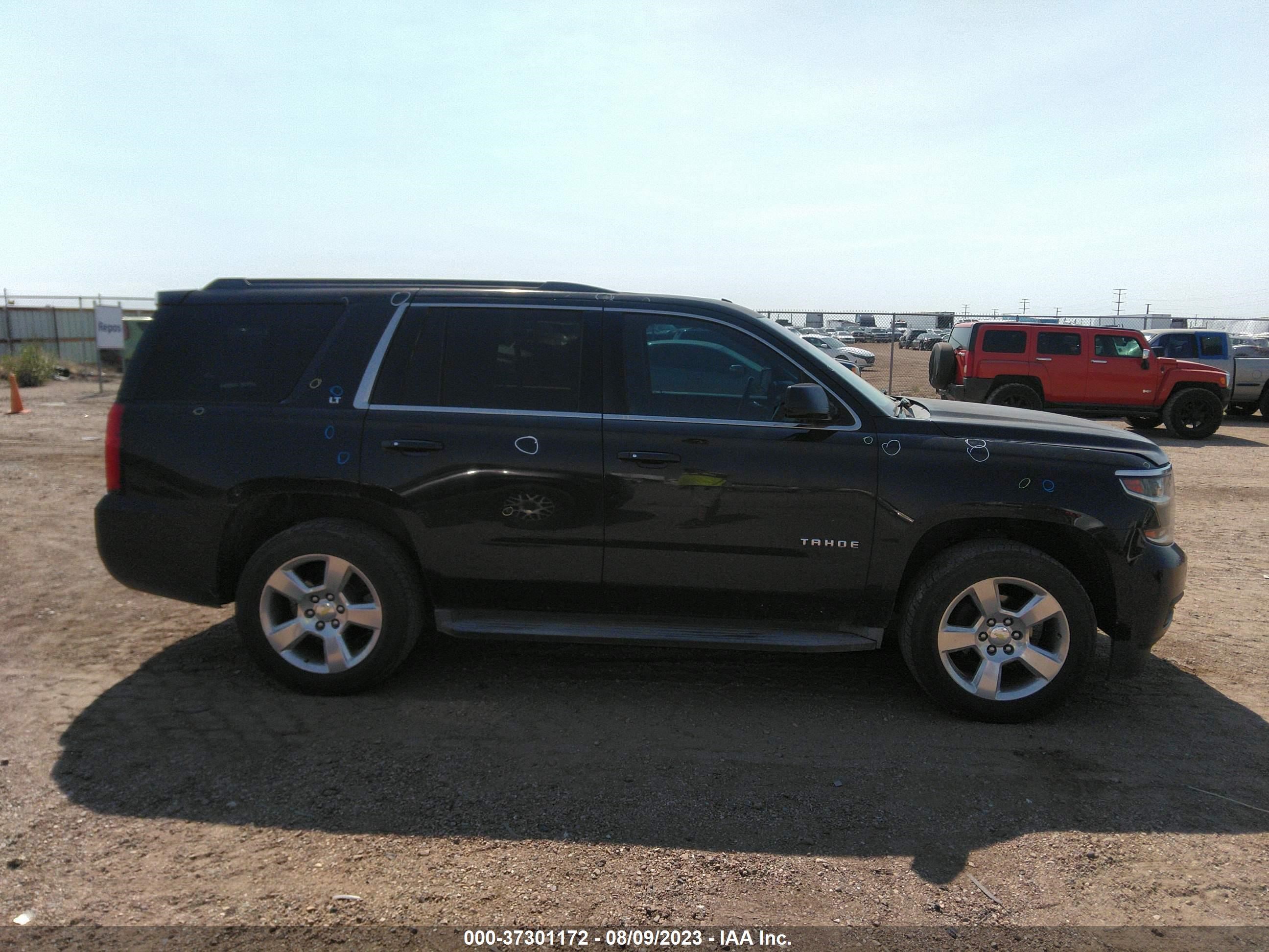 Photo 12 VIN: 1GNSKBKC2FR211301 - CHEVROLET TAHOE 