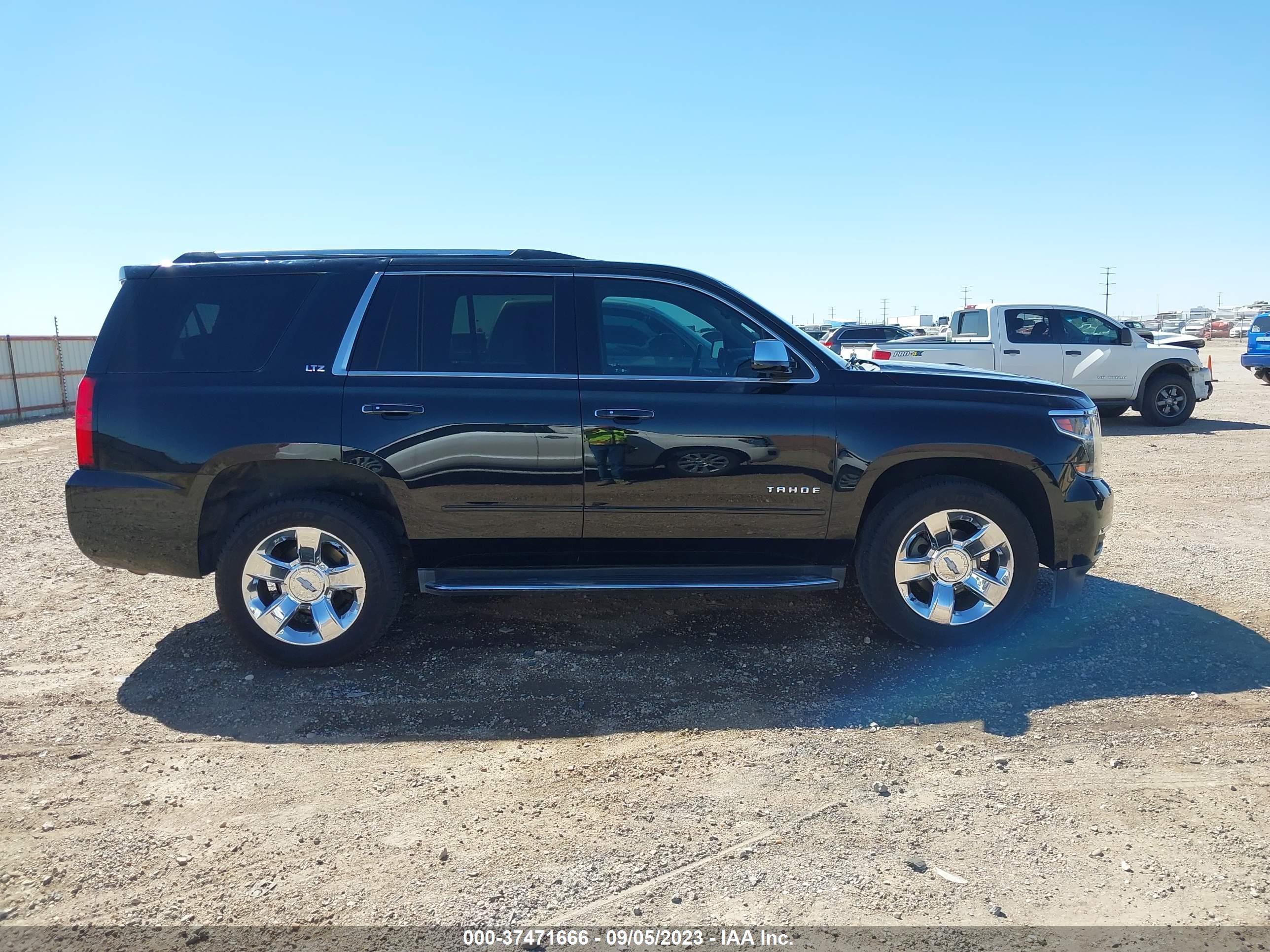 Photo 12 VIN: 1GNSKCKC3GR297595 - CHEVROLET TAHOE 