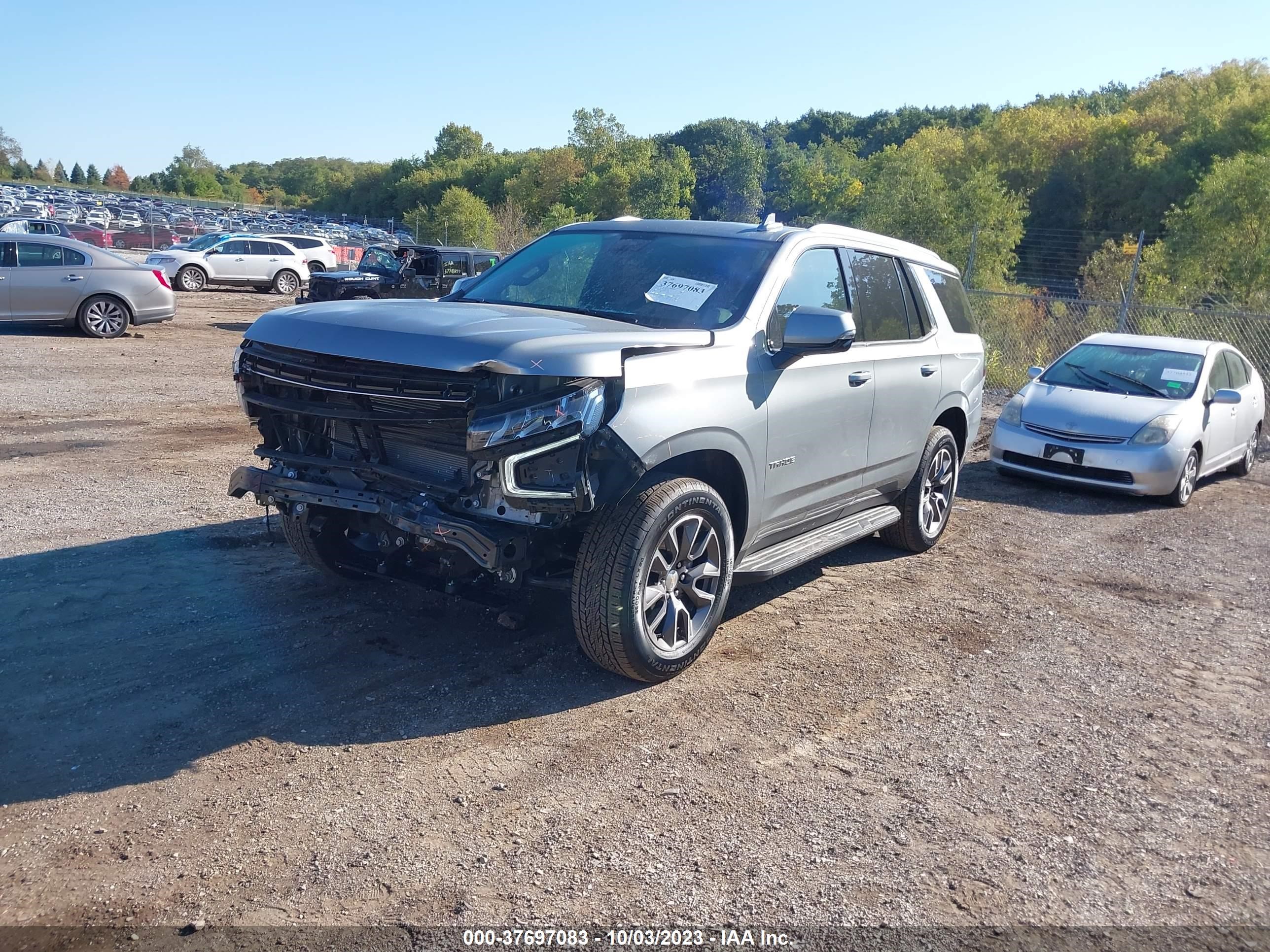 Photo 1 VIN: 1GNSKNKD3PR242634 - CHEVROLET TAHOE 